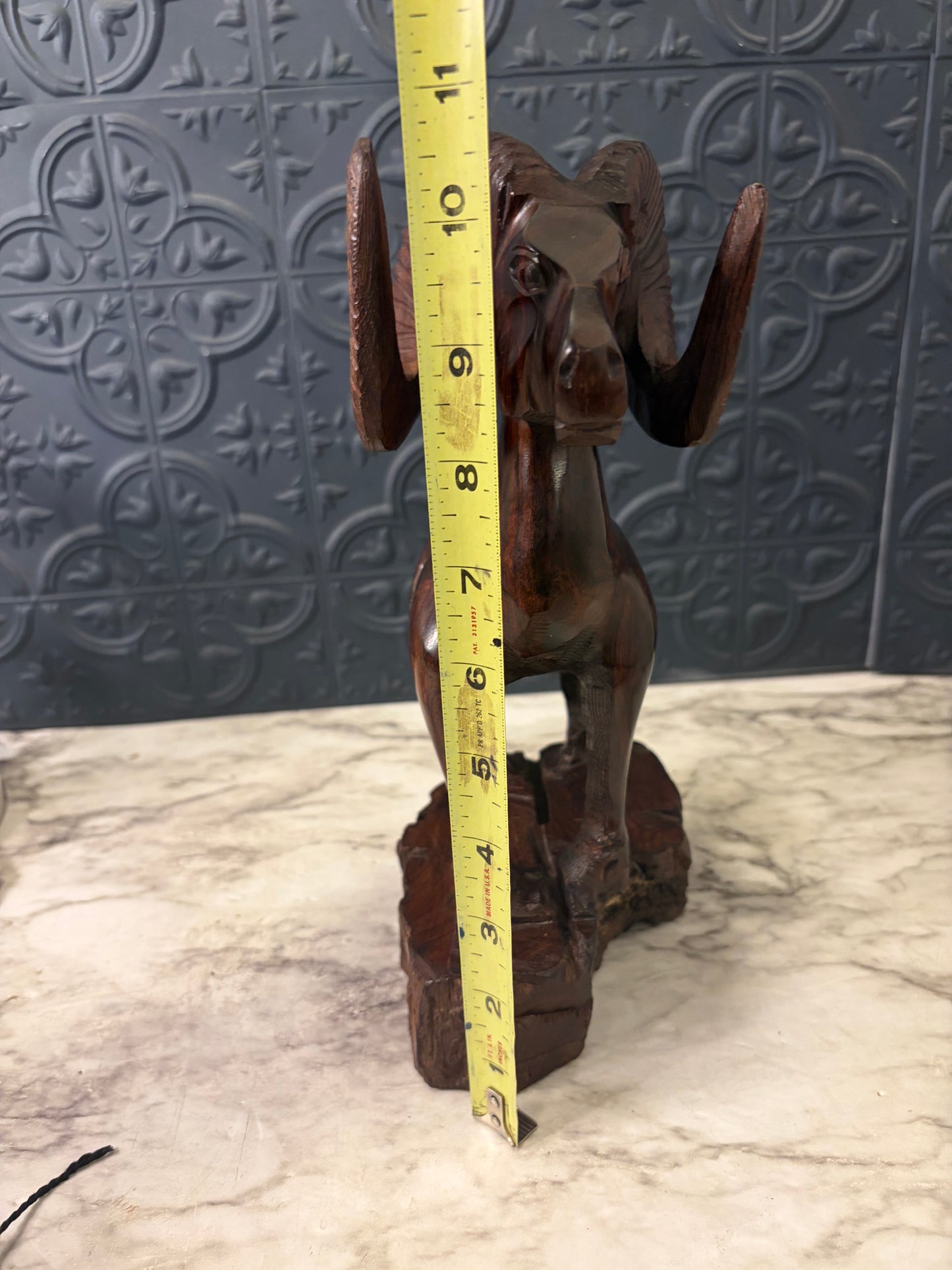 Ironwood Ram Statue