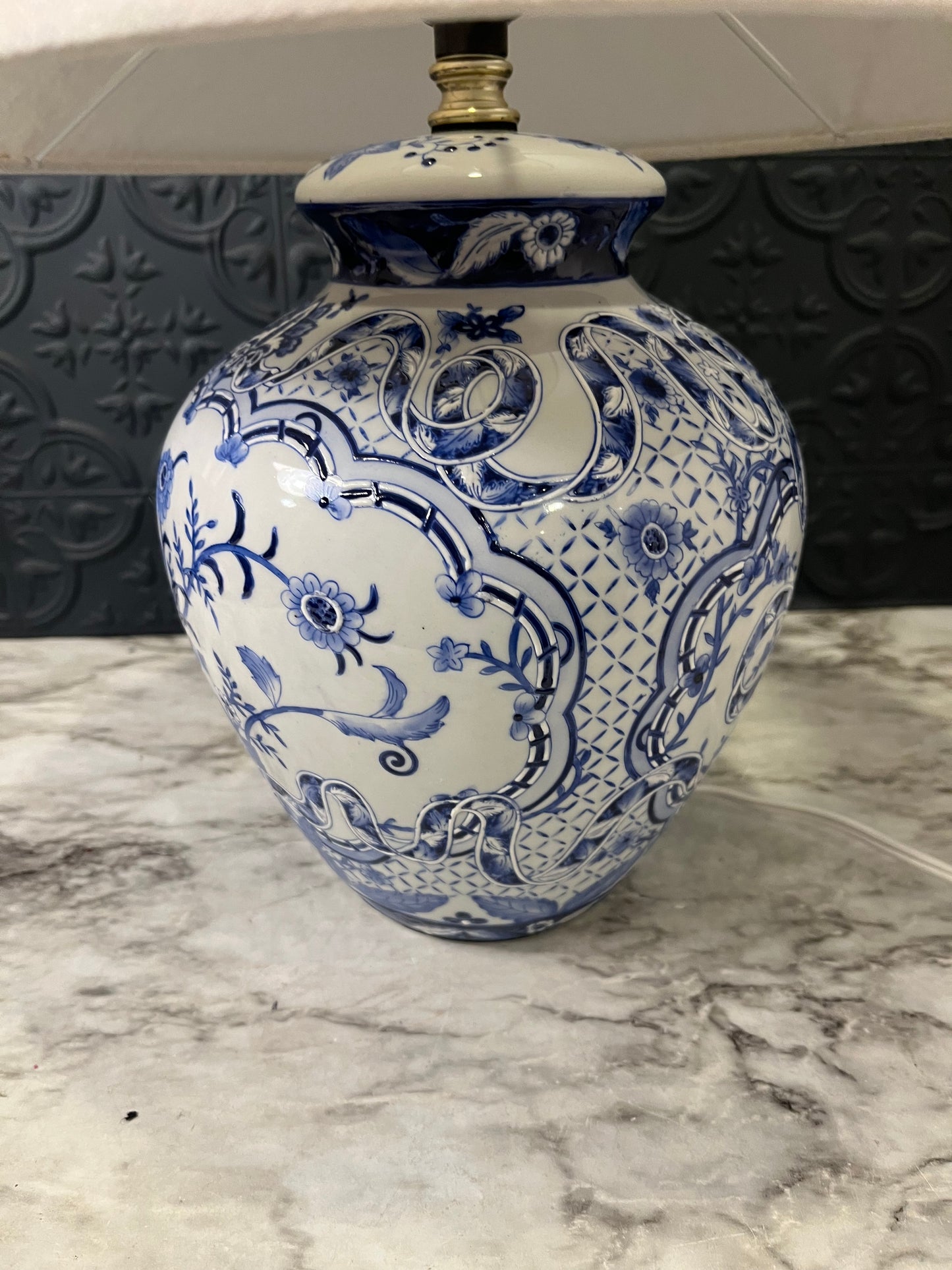 Blue and white table lamp with ribbon
