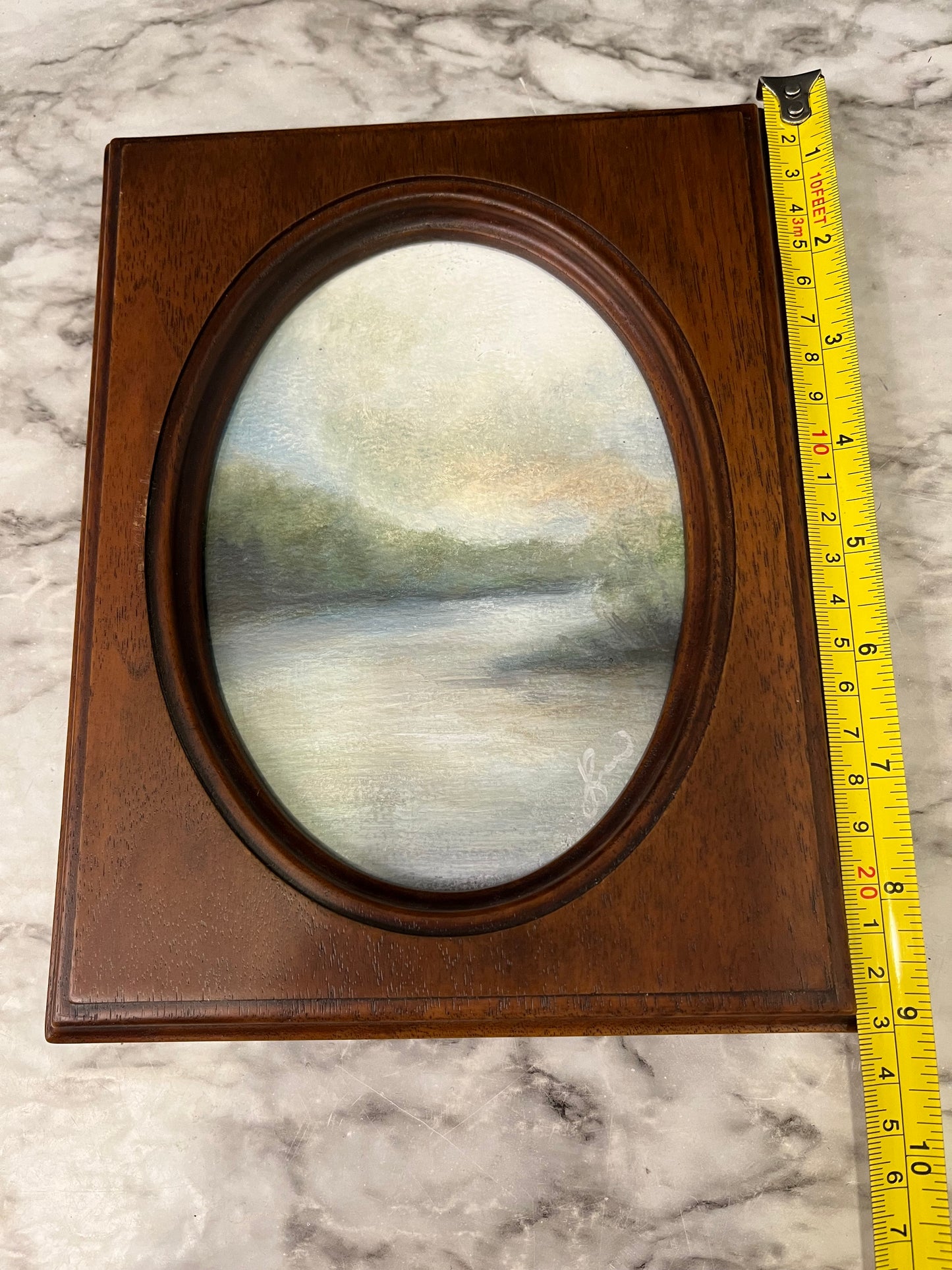 Lazy River painting in wood oval by Jessie