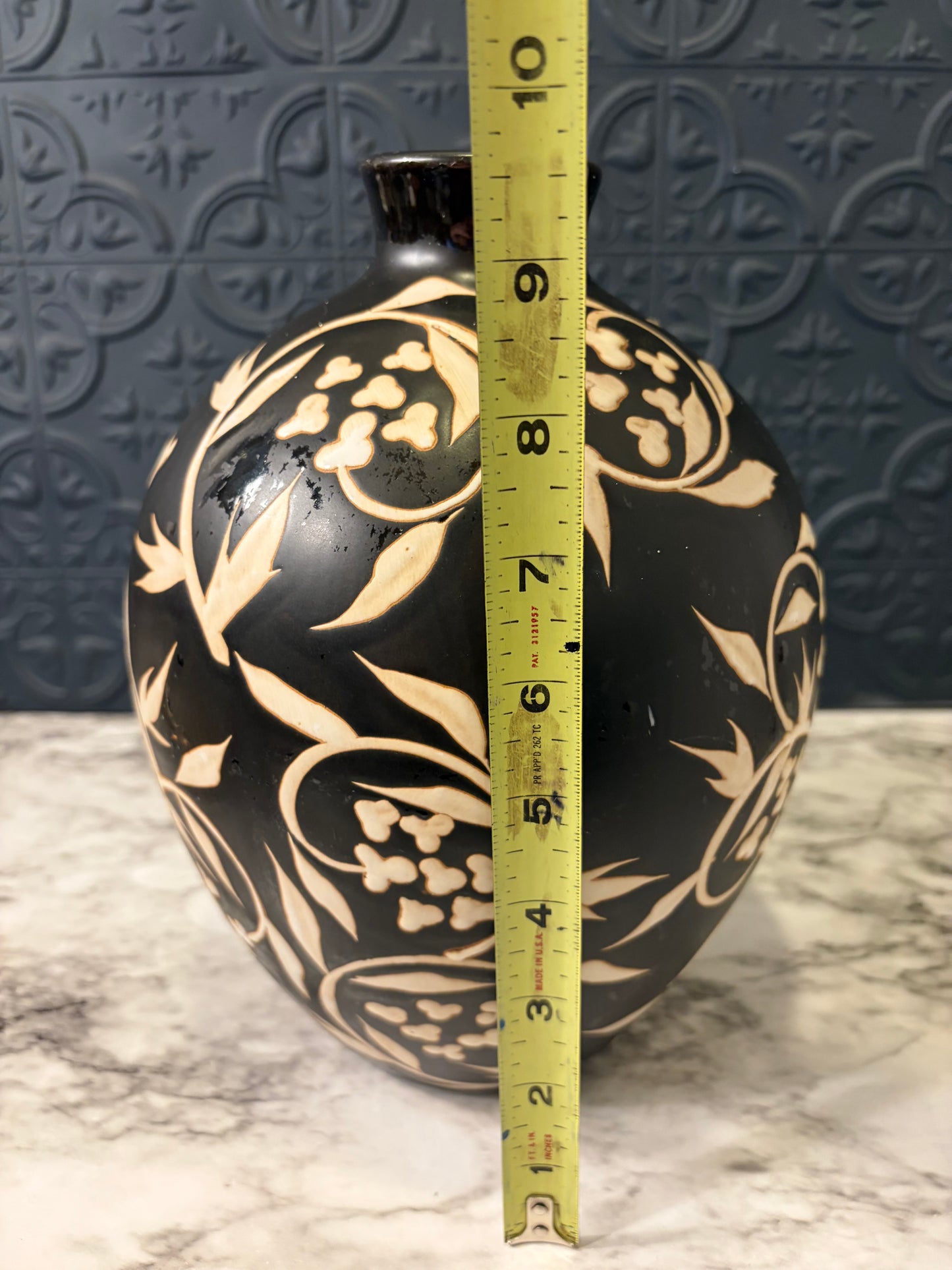Black and Tan Ceramic Vase with Leaf Pattern