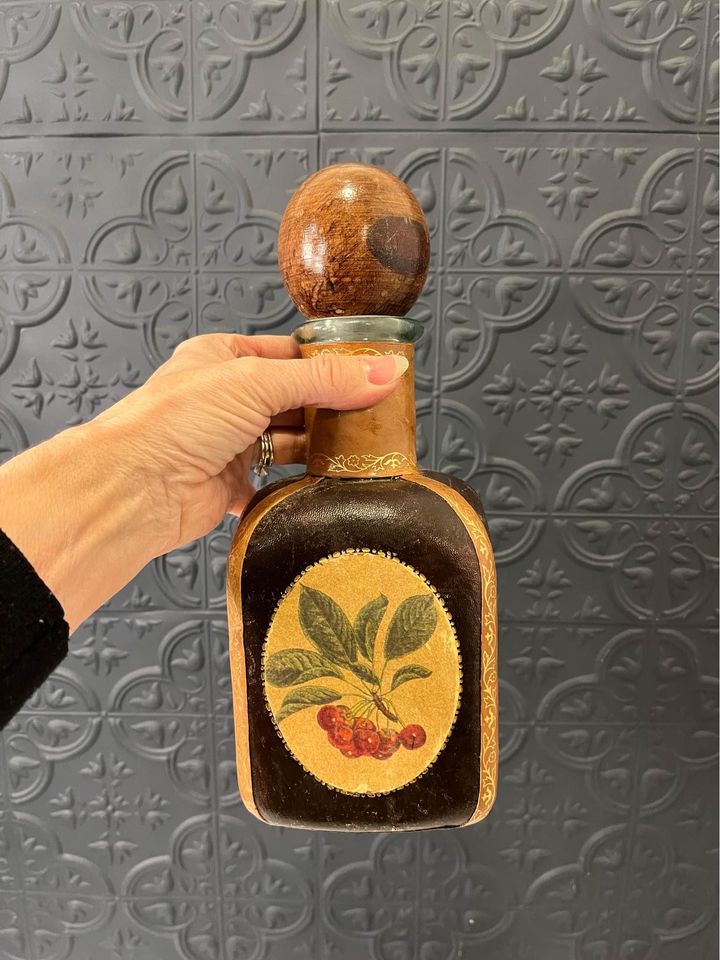 Brown Leather Wrapped Decanter with fruit