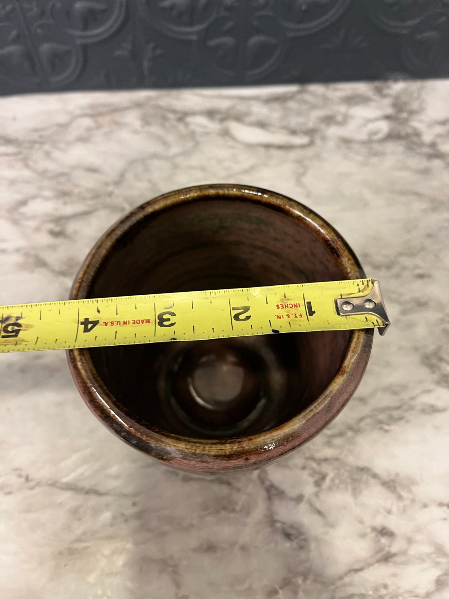 Studio pottery vase with thick black rim