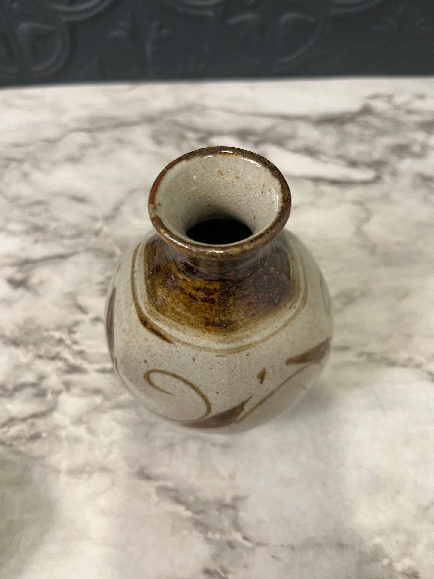 Small Tan Pottery Vase with Brown Leaf design