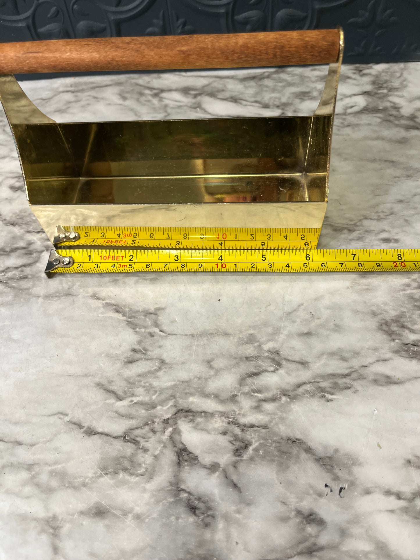 Brass caddy with wood handle