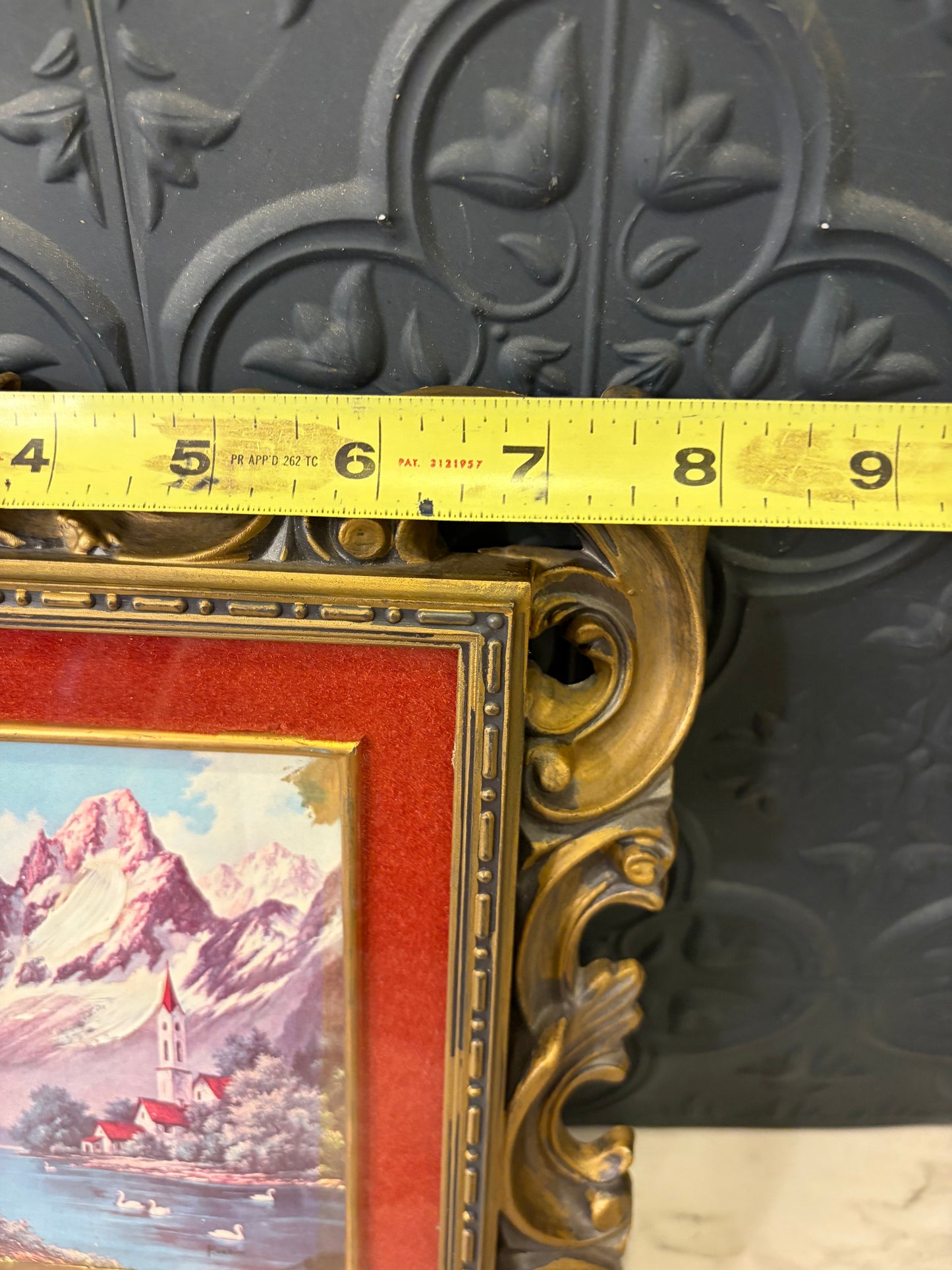 Black and Gold Molded Frame of Snow Covered Mountain