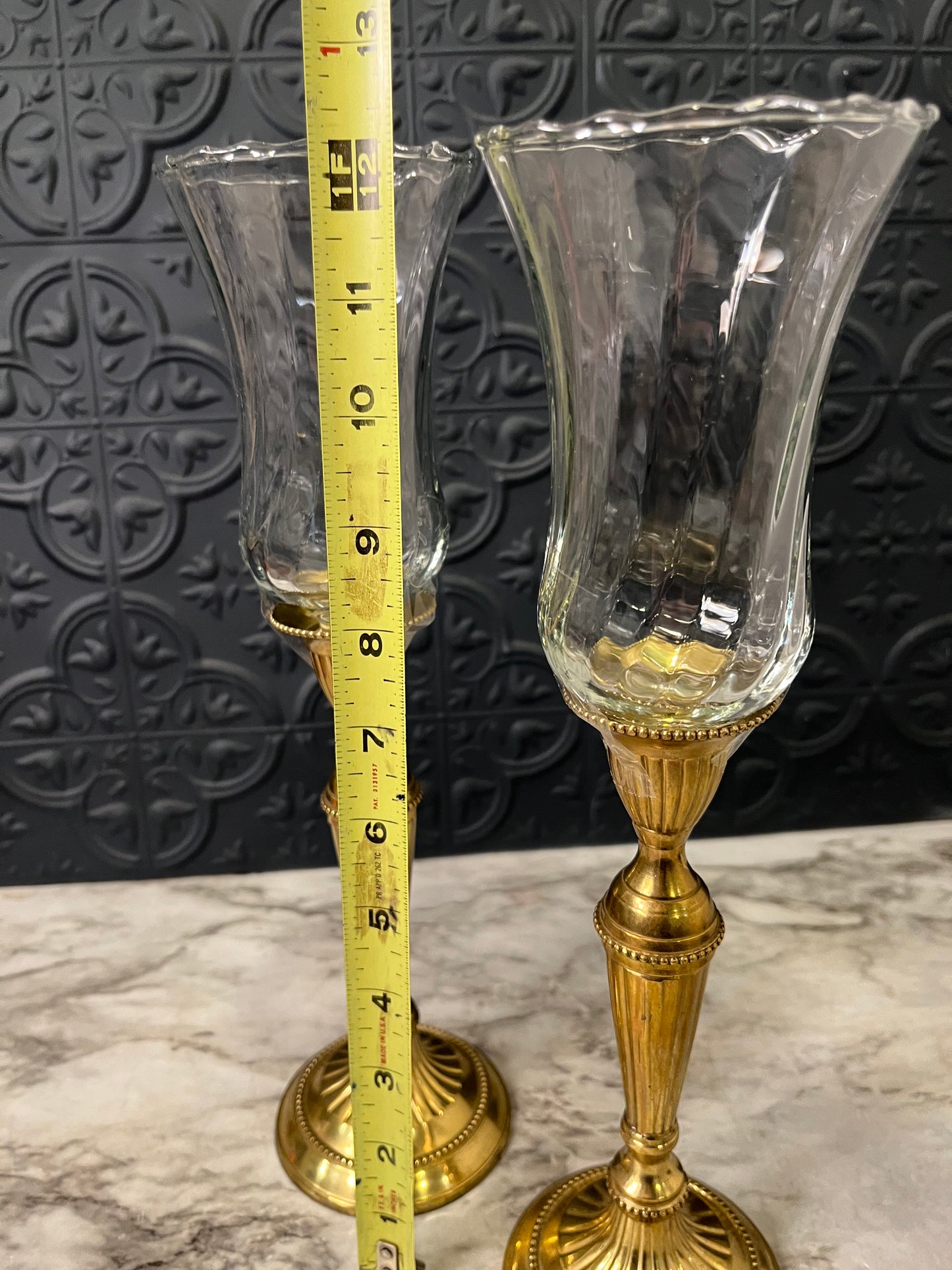 Brass candle holders with clear votive holders