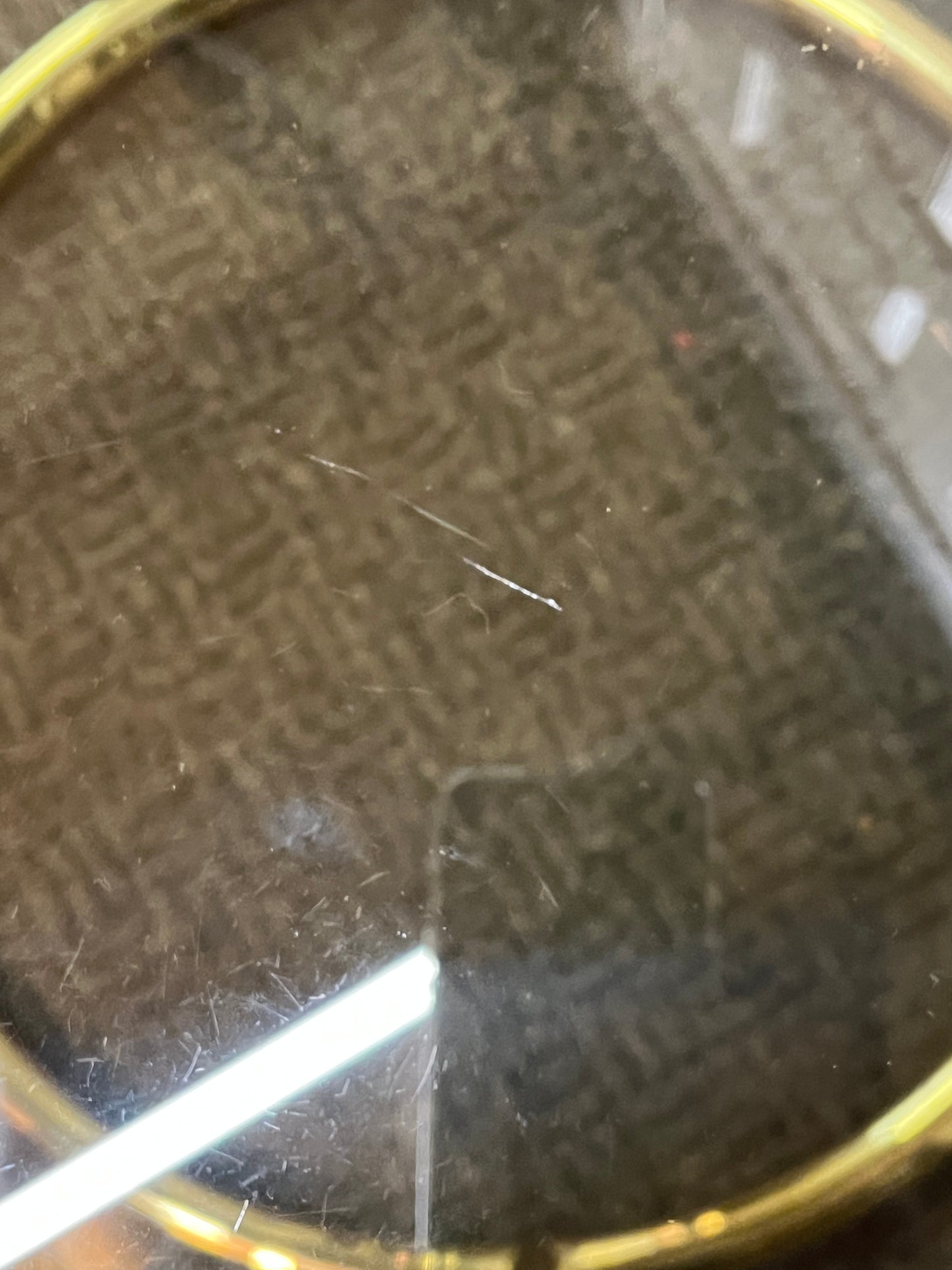 Round Brass side table with smoke glass