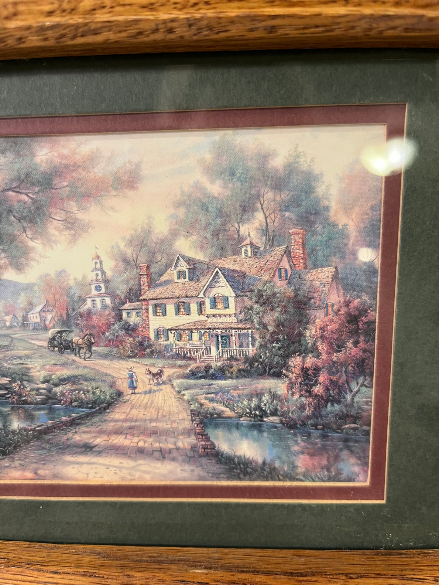 Framed Kincaid print with pathway