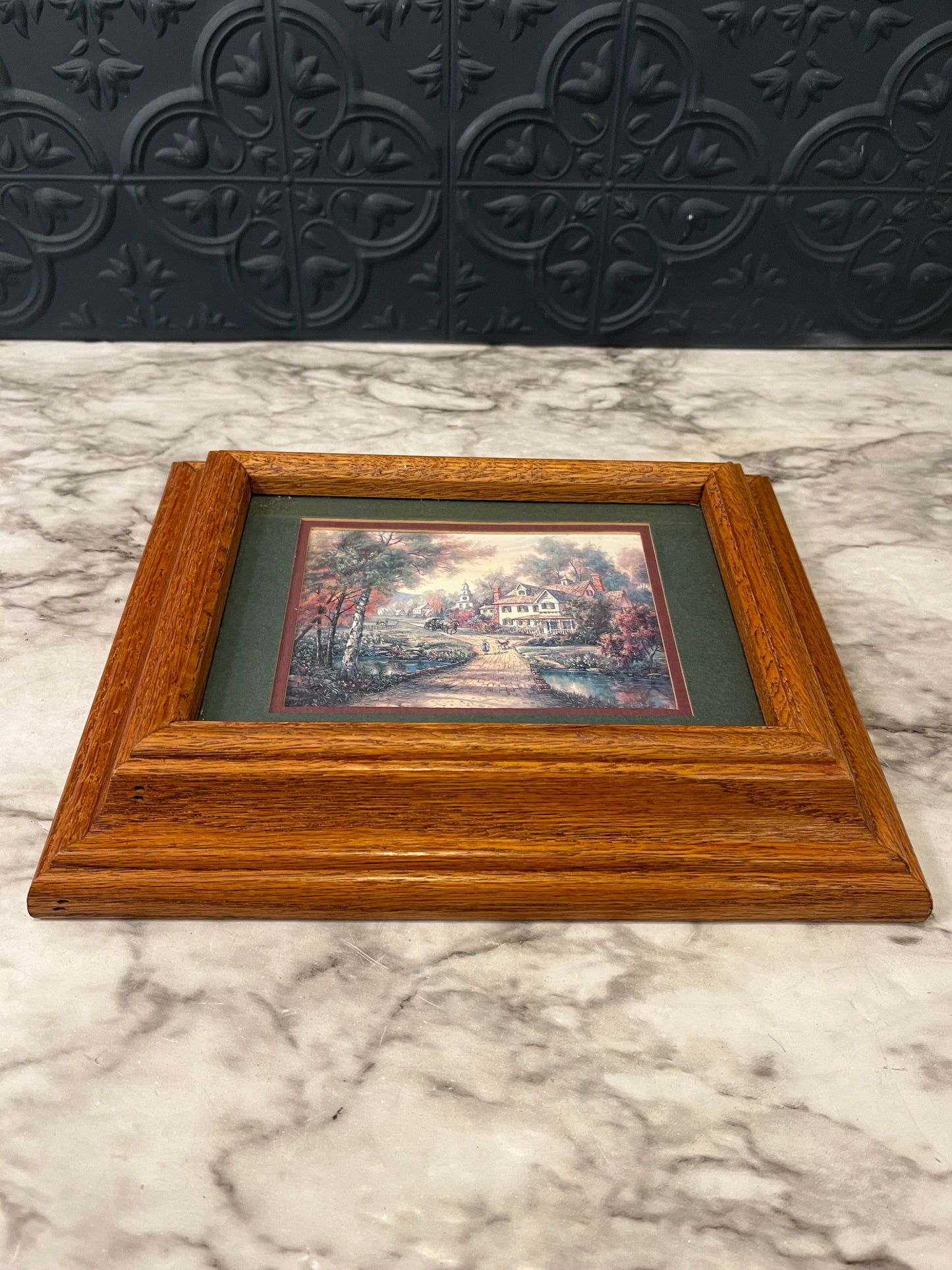 Framed Kincaid print with pathway