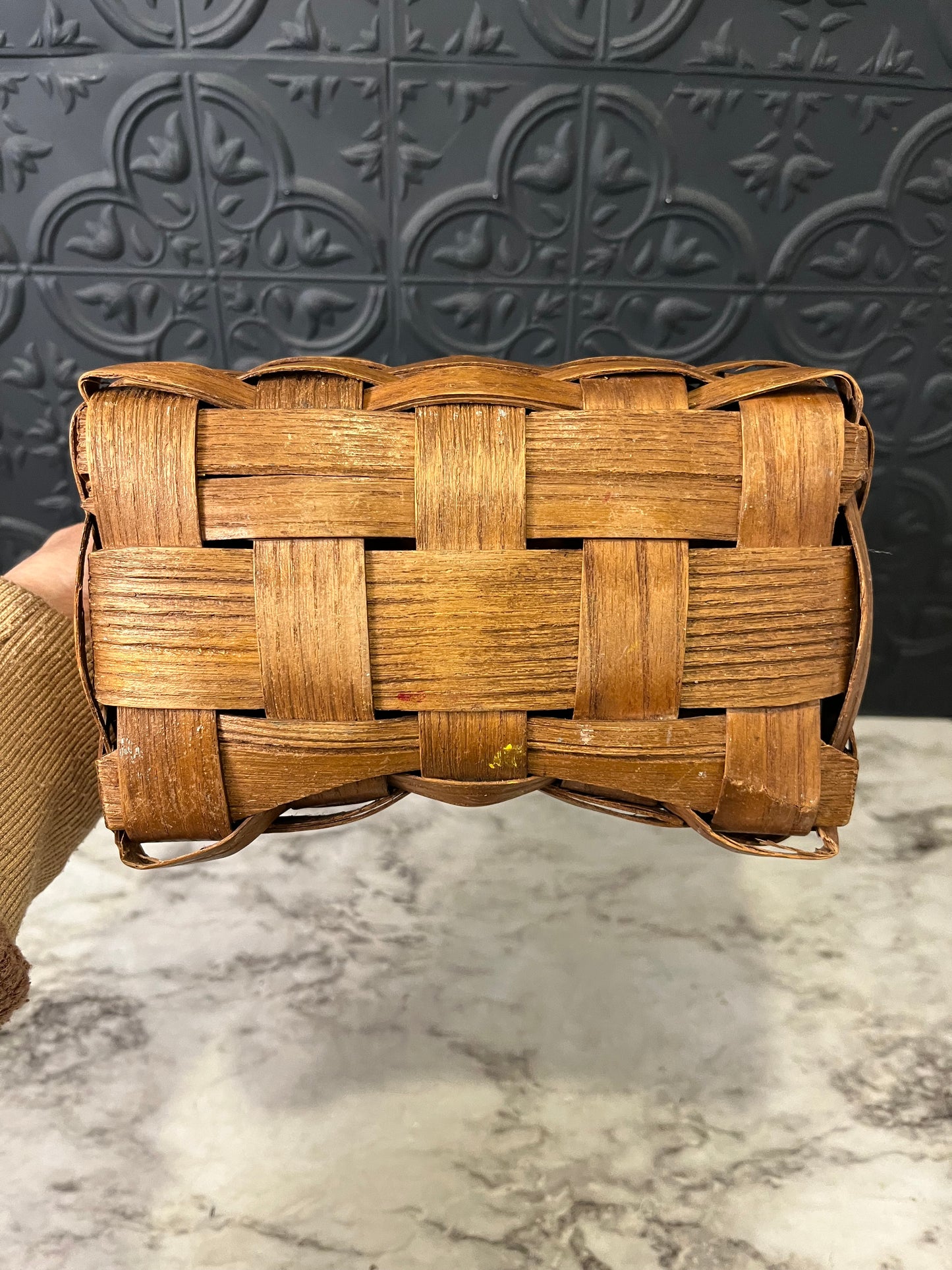 Small woven basket with lid and handle