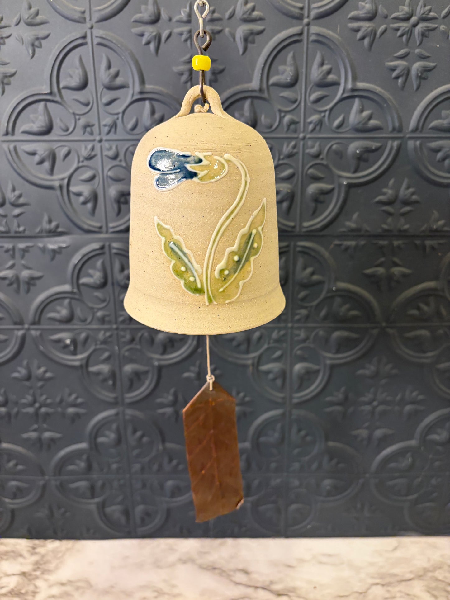 Cream Pottery Windchime with blue Flowers