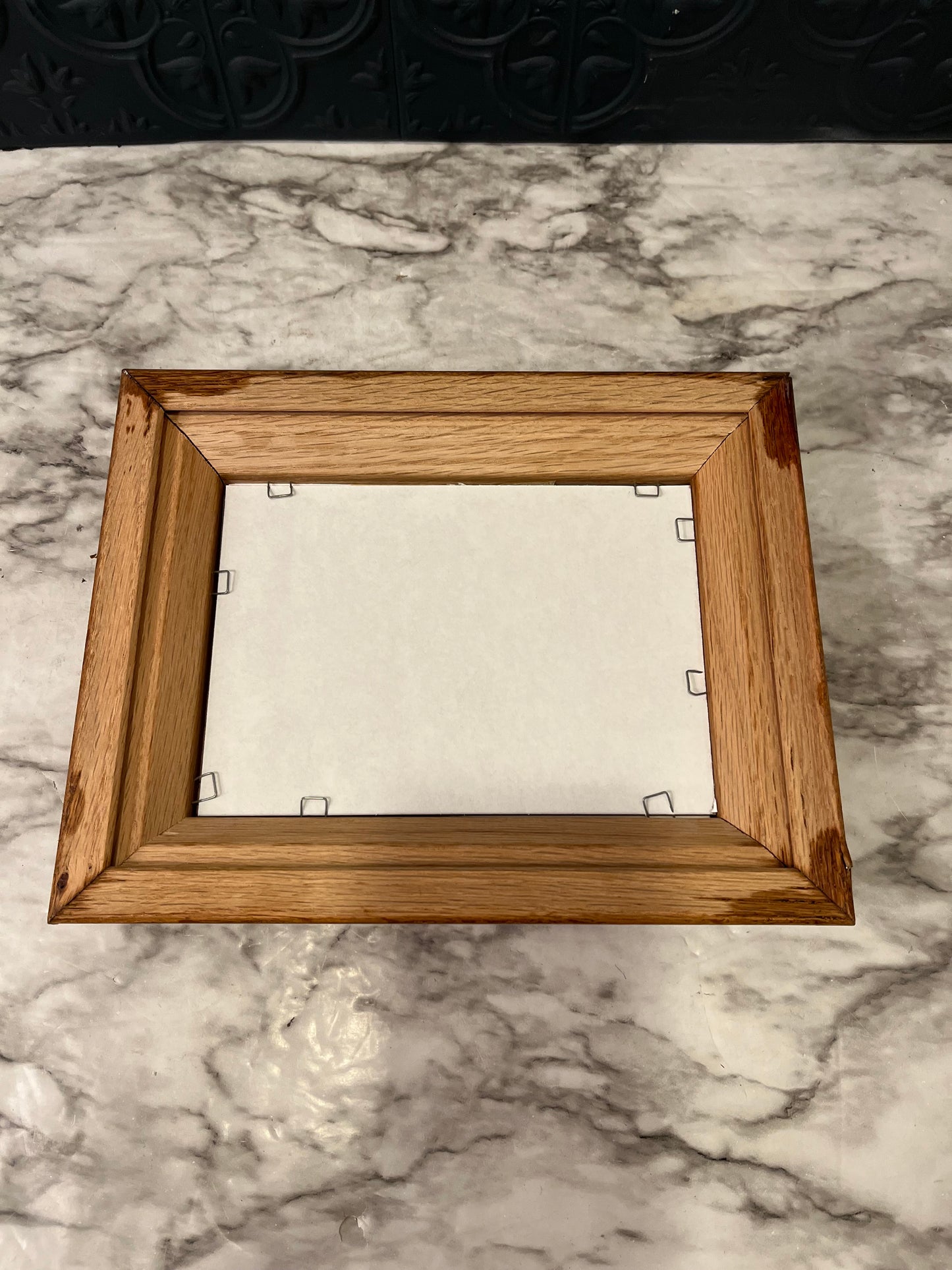 Framed Kincaid print with pathway