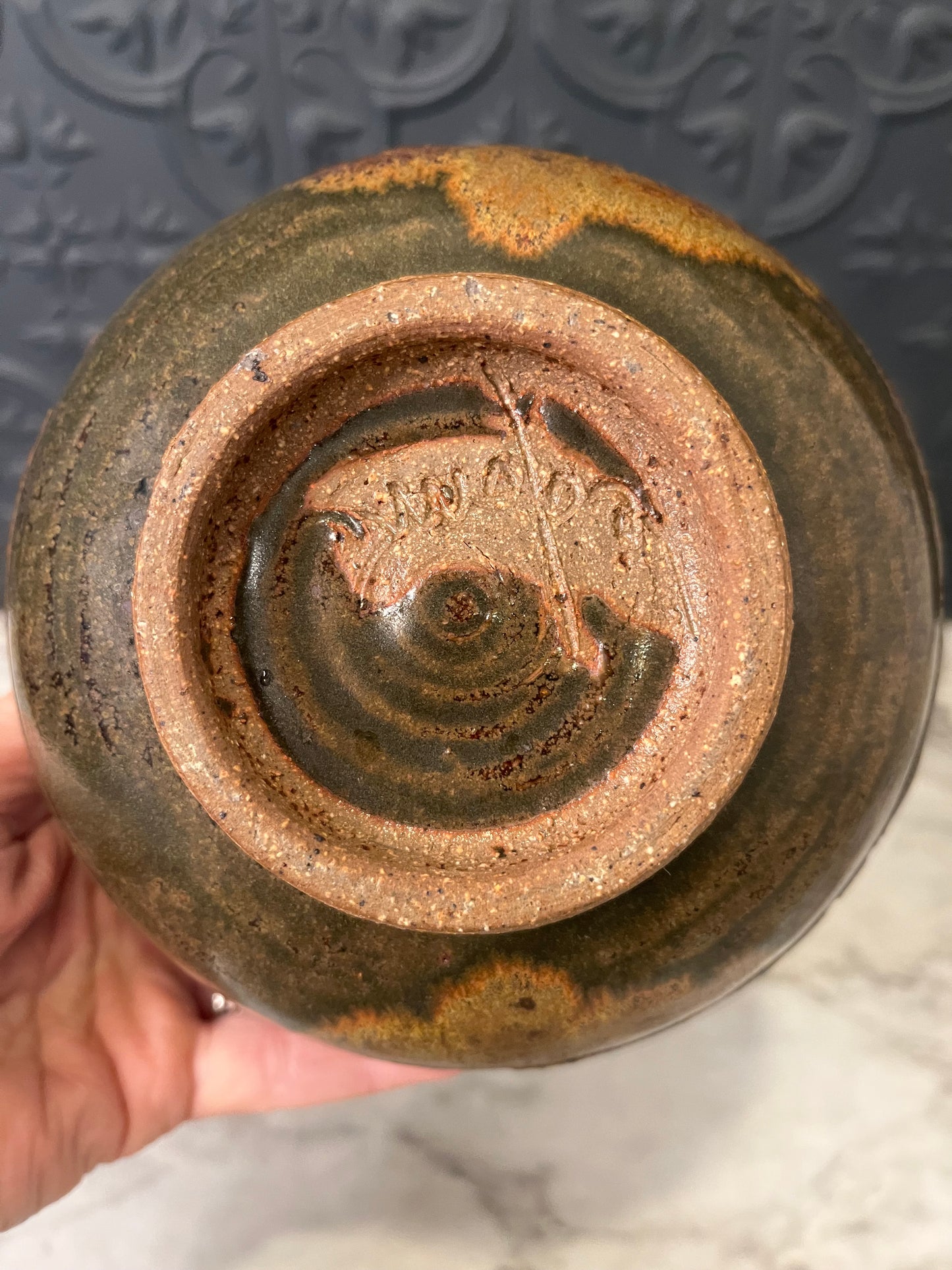 Brown Pottery Bowl with Leaf