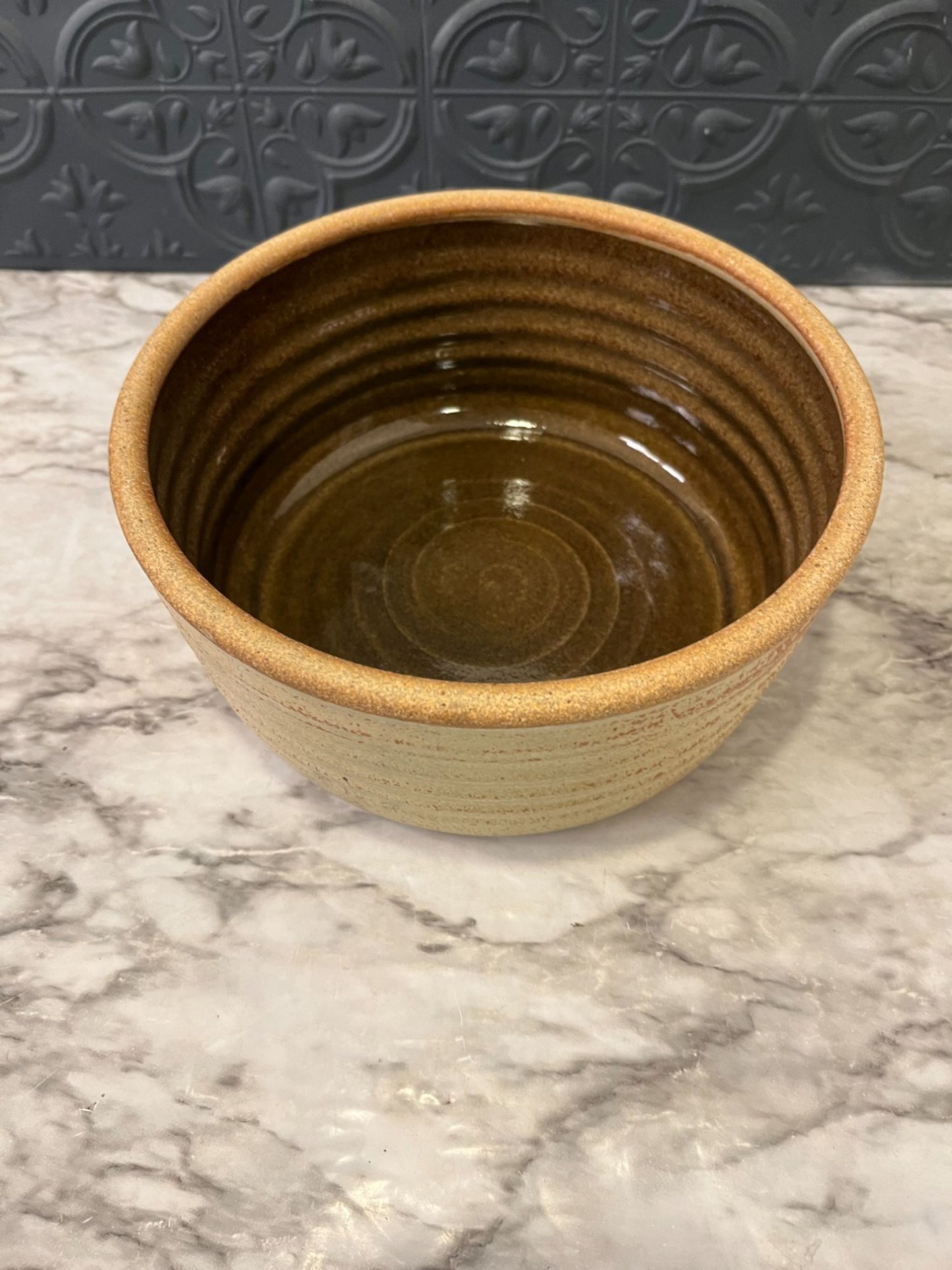 Tan Ribbed Pottery Bowl With Brown Glaze Inside
