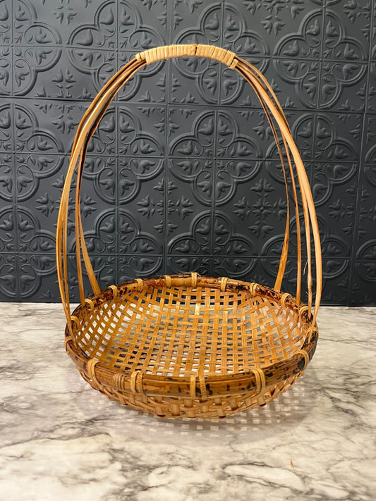 Shallow basket with tall handle