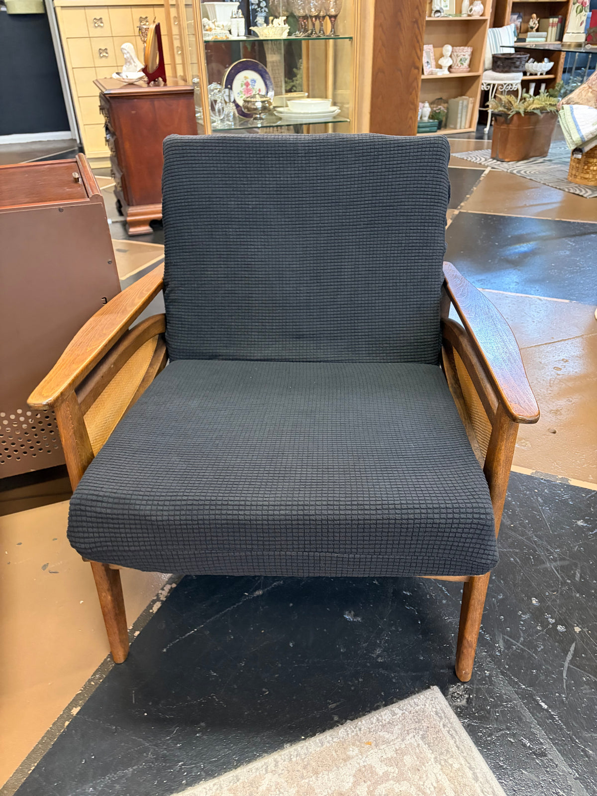 Mid Century Chair with Cane Side and Black Cusion
