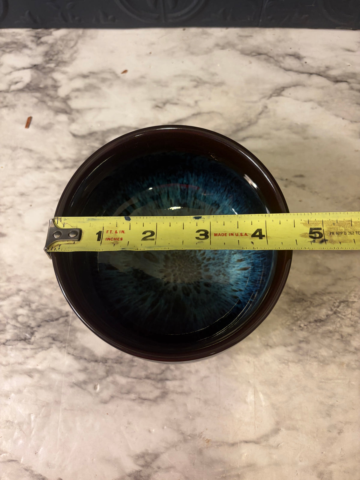Jianzhan Ceramic Tea Bowl with Vibrant Blue Starburst