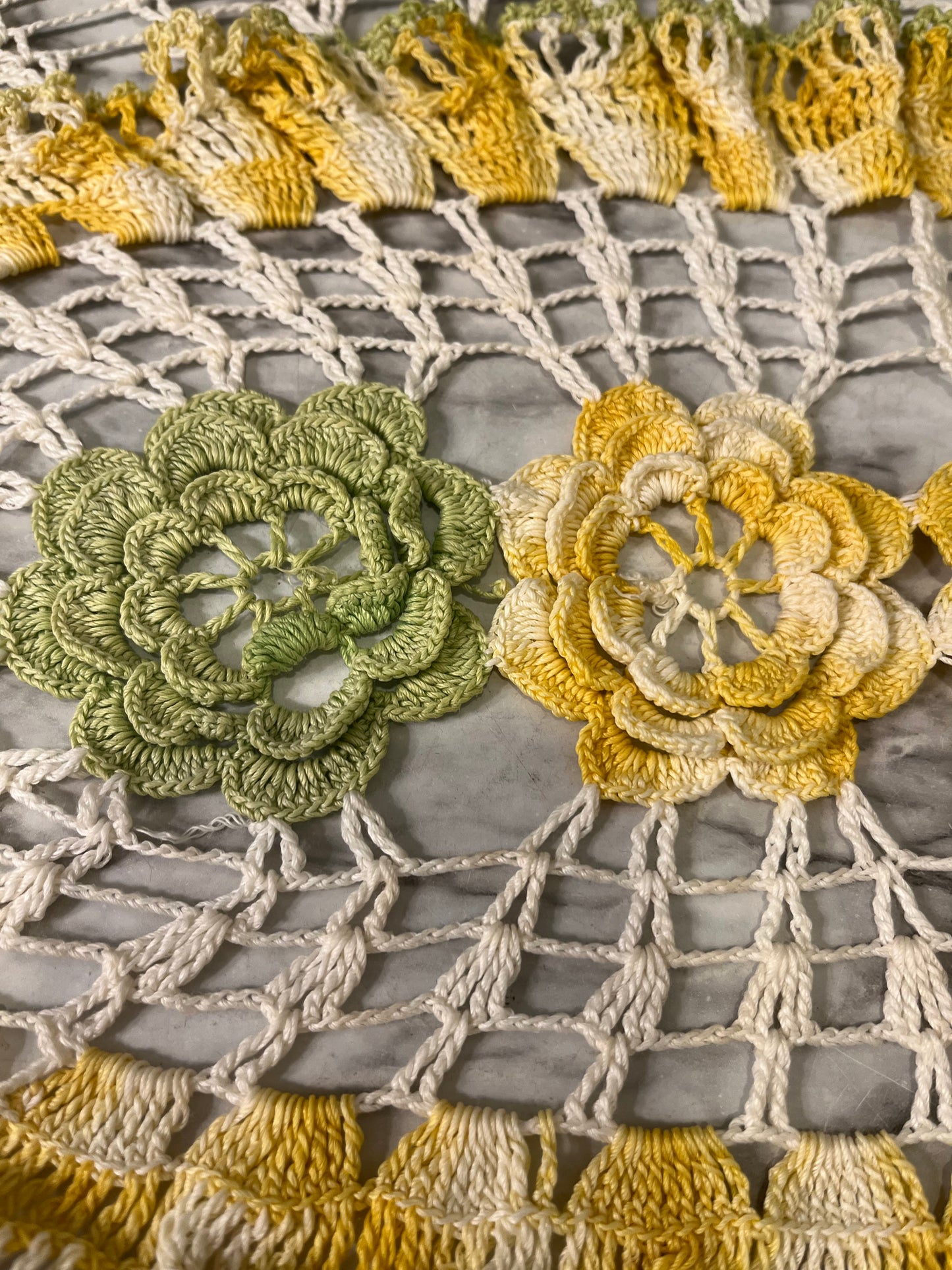Yellow and green crochet doily