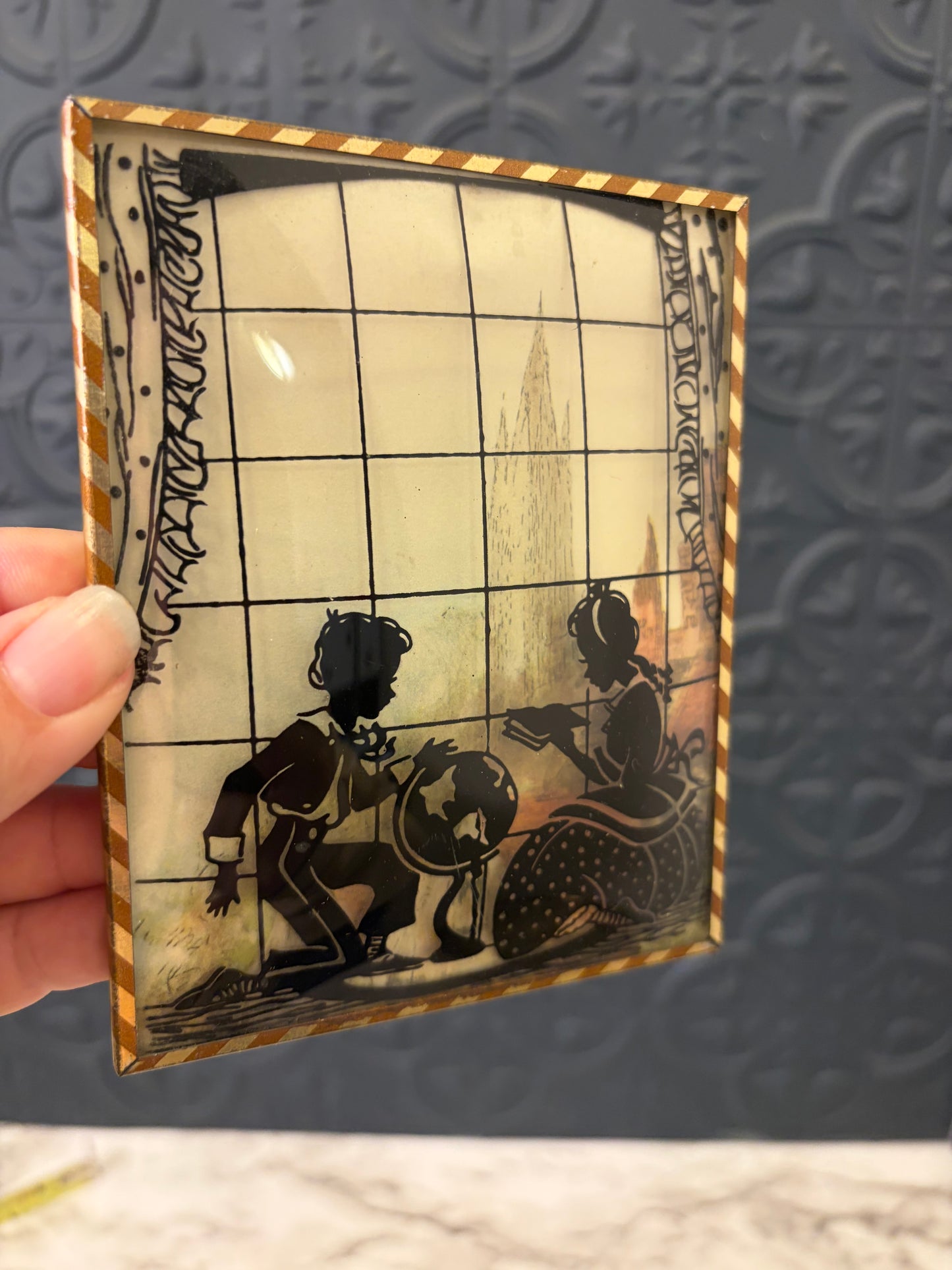 Reverse Painted Convex Silhouette Couple Reading/Globe