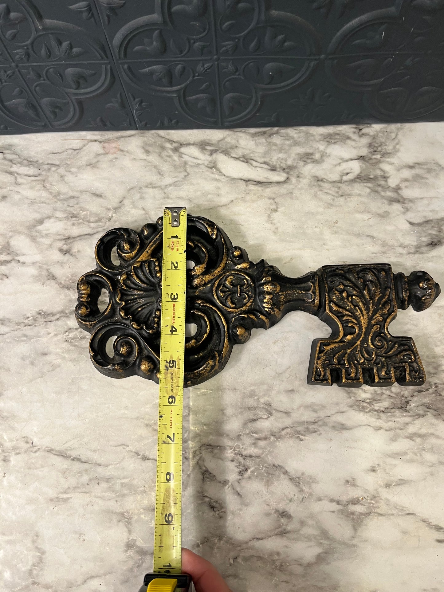 Black and Gold Metal Key
