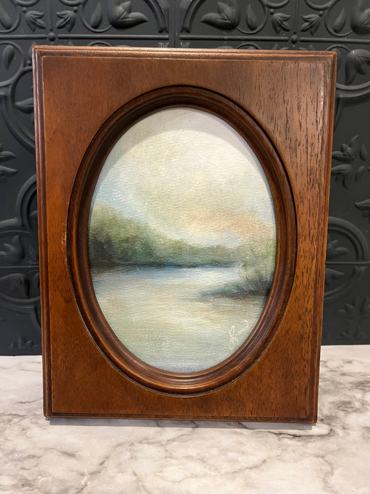 Lazy River painting in wood oval by Jessie