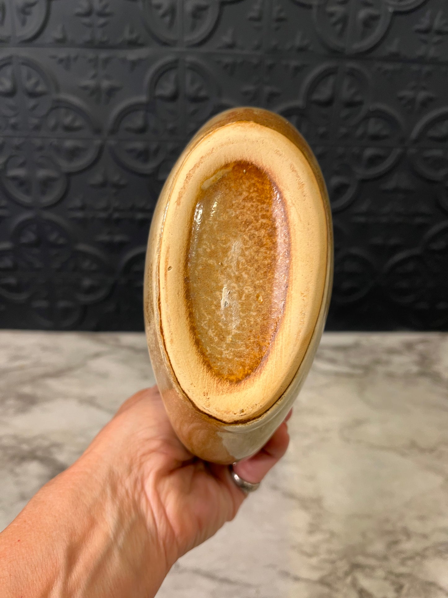 Tan Ceramic Vase with Brown Rim and Modern Handle design