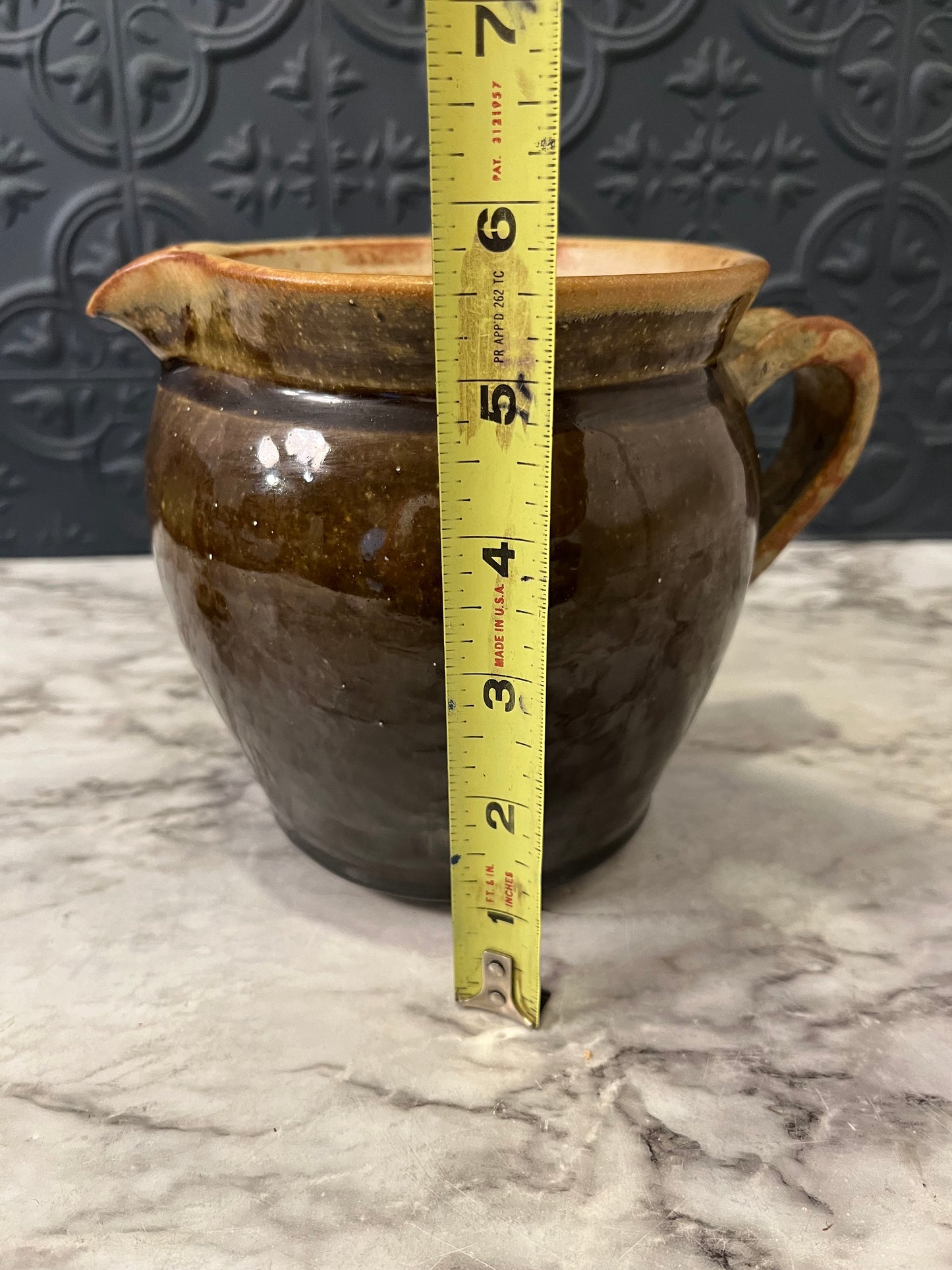 Brown Pottery Pitcher Light colored Rim