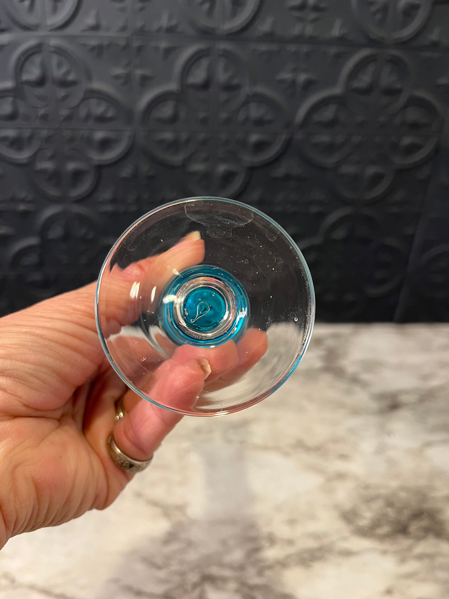 Blue glass bud vase with clear base