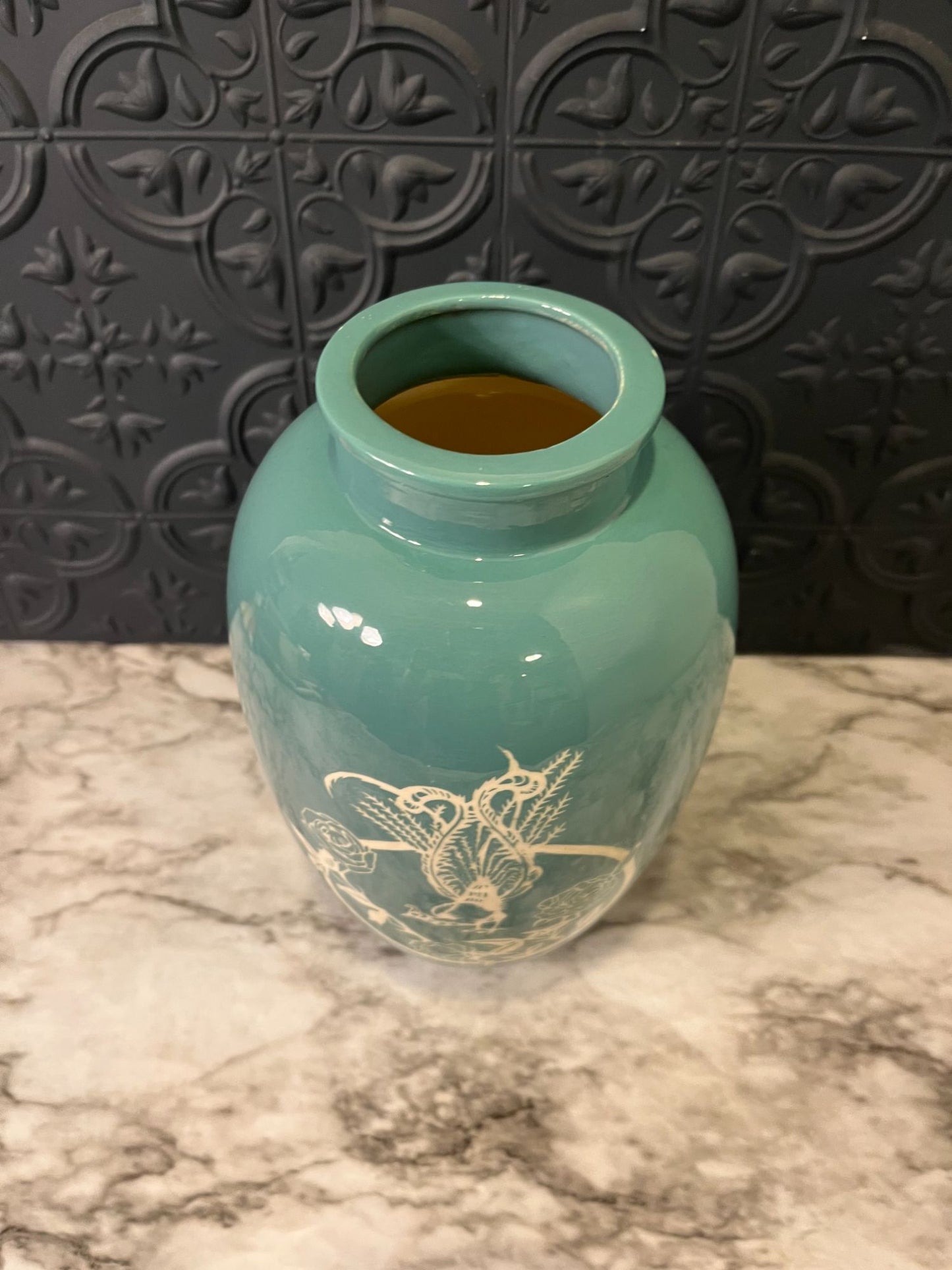 Blue vase with rooster