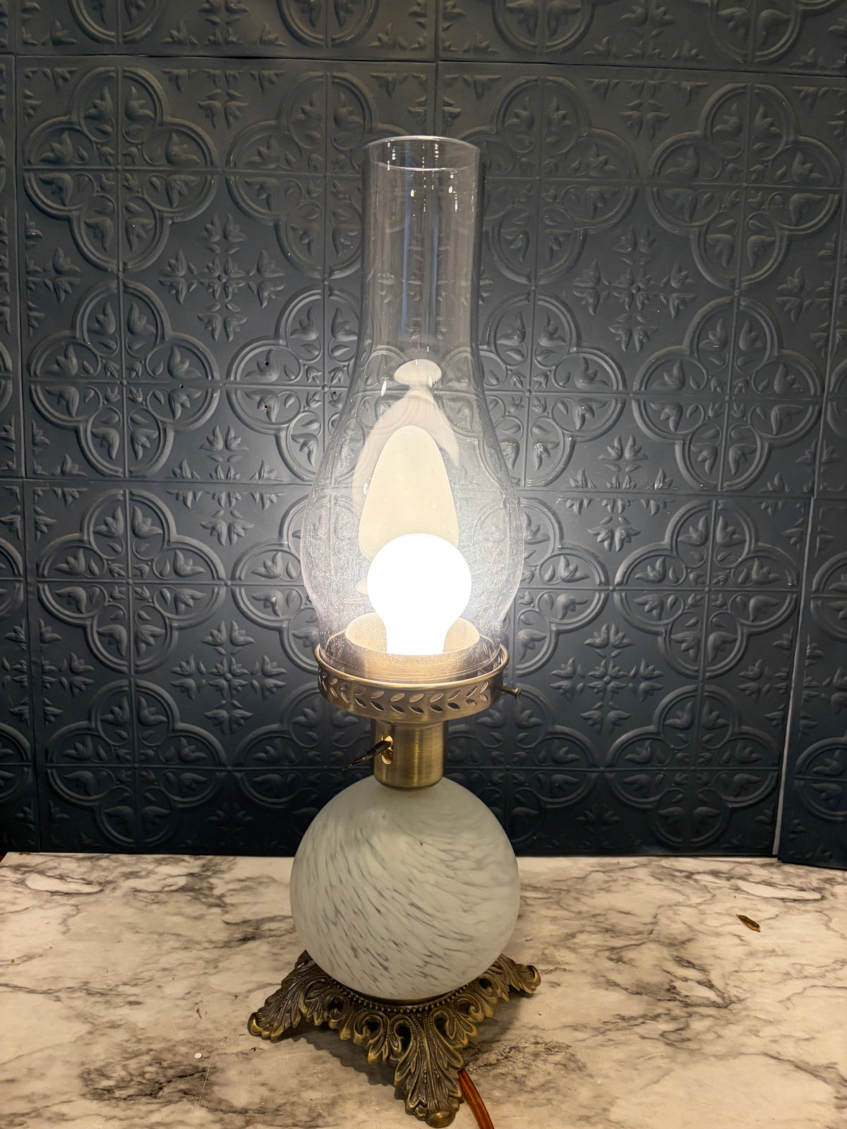 Vintage Brass lamp with round Glass ball and hurricane shade