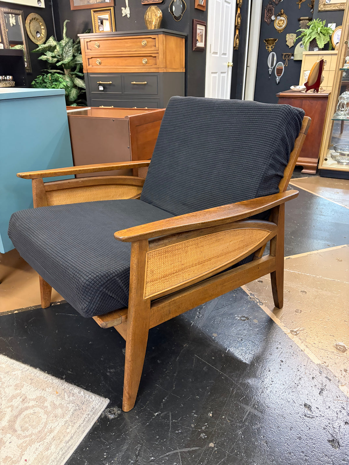 Mid Century Chair with Cane Side and Black Cusion