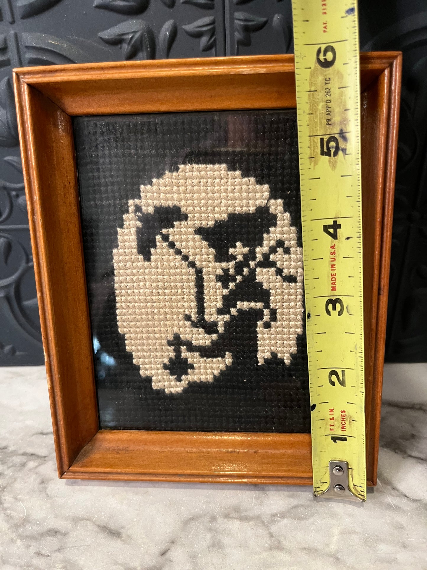 Black and white cross stitch woman