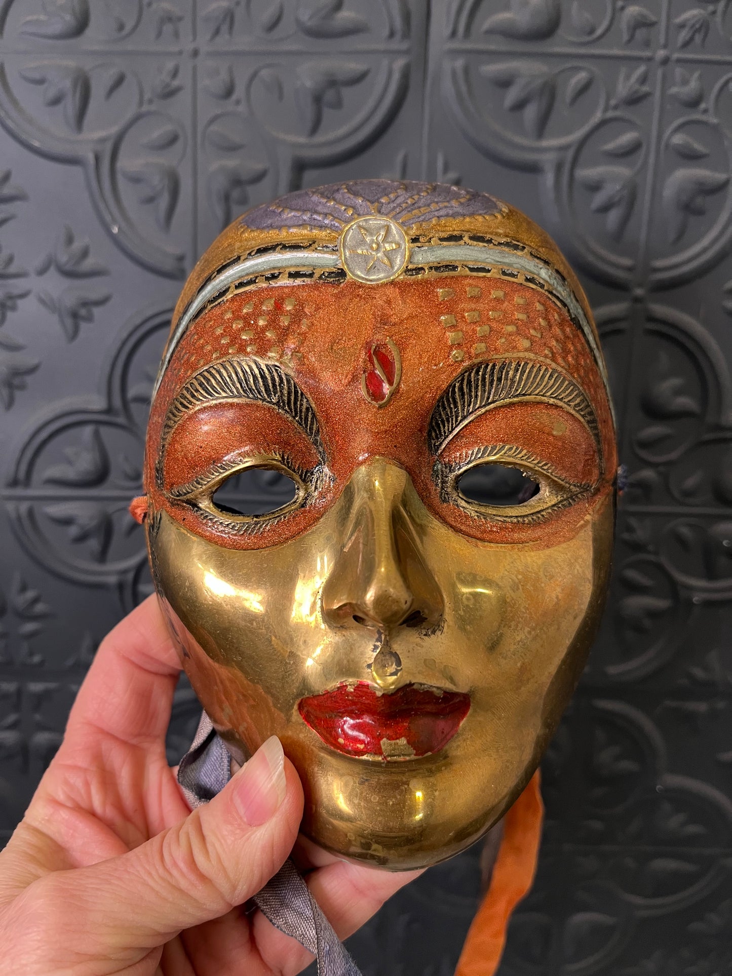 Brass and Enamel Decorative Mask Orange with Red Dot