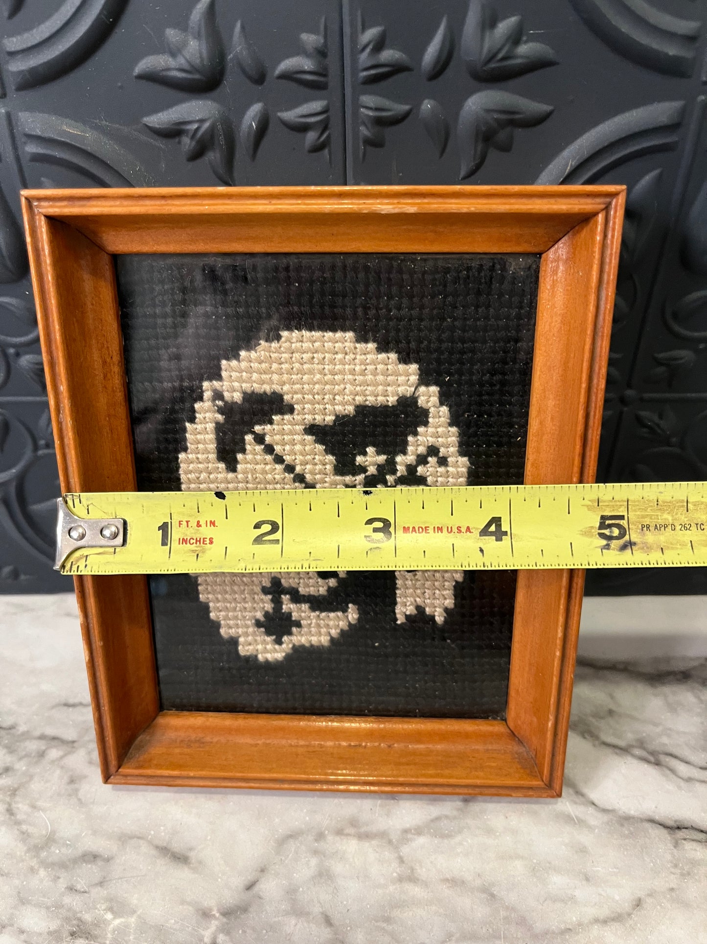 Black and white cross stitch woman