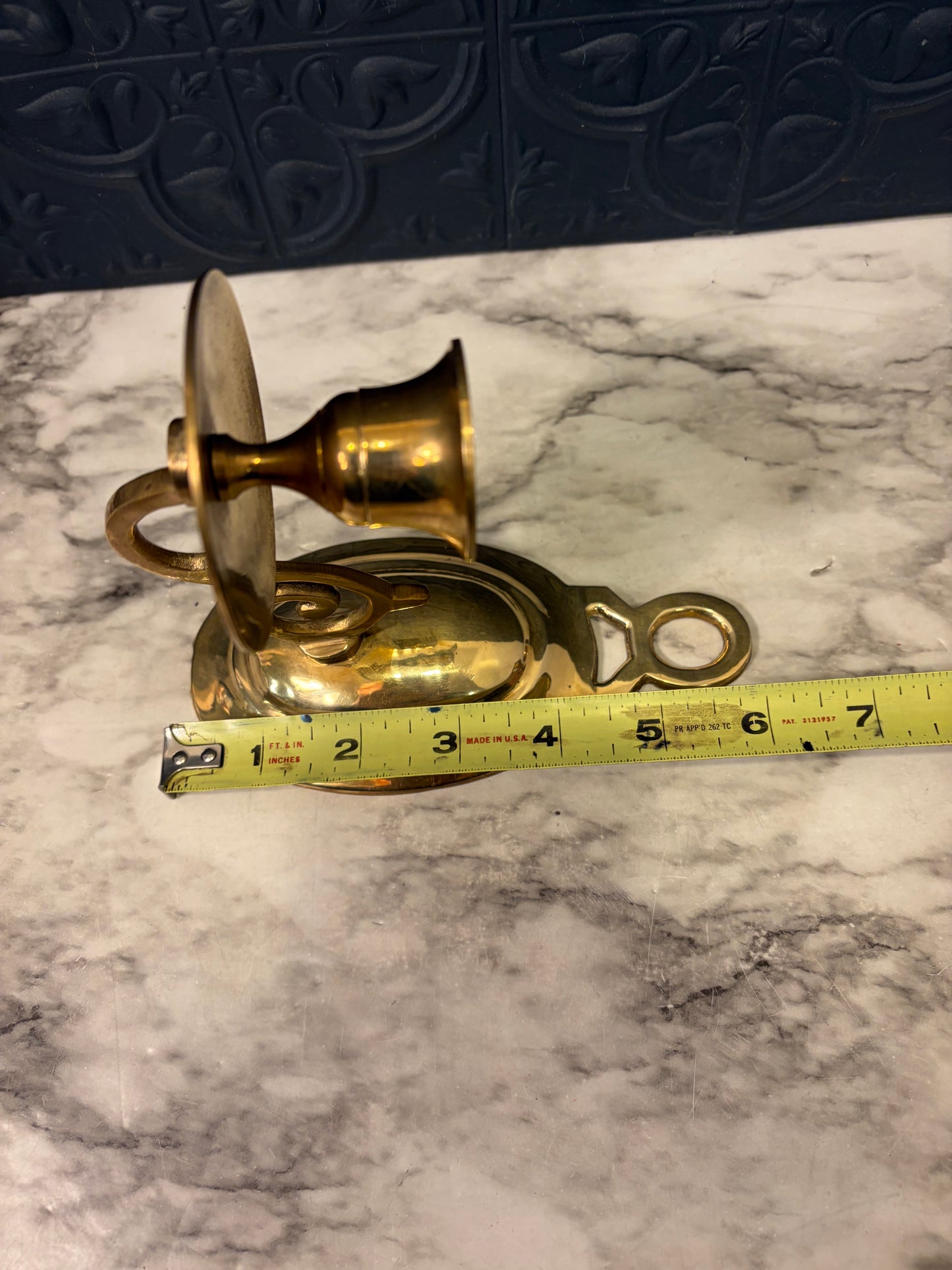 Oval Brass Sconce with swirl design
