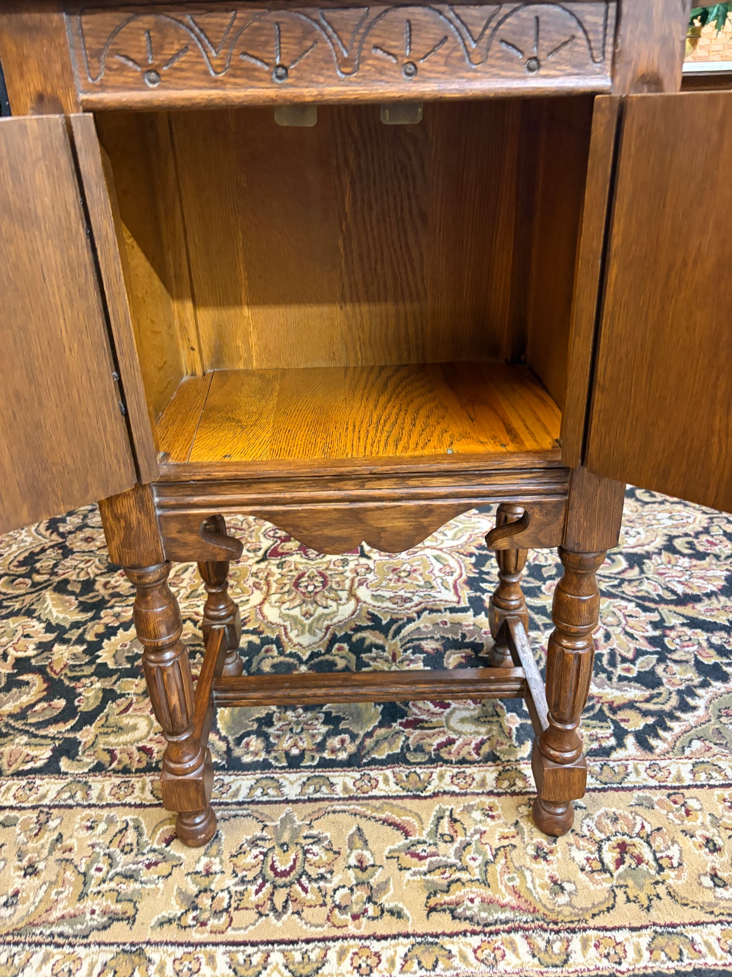 Antique Wood Cabinet with Carved Details