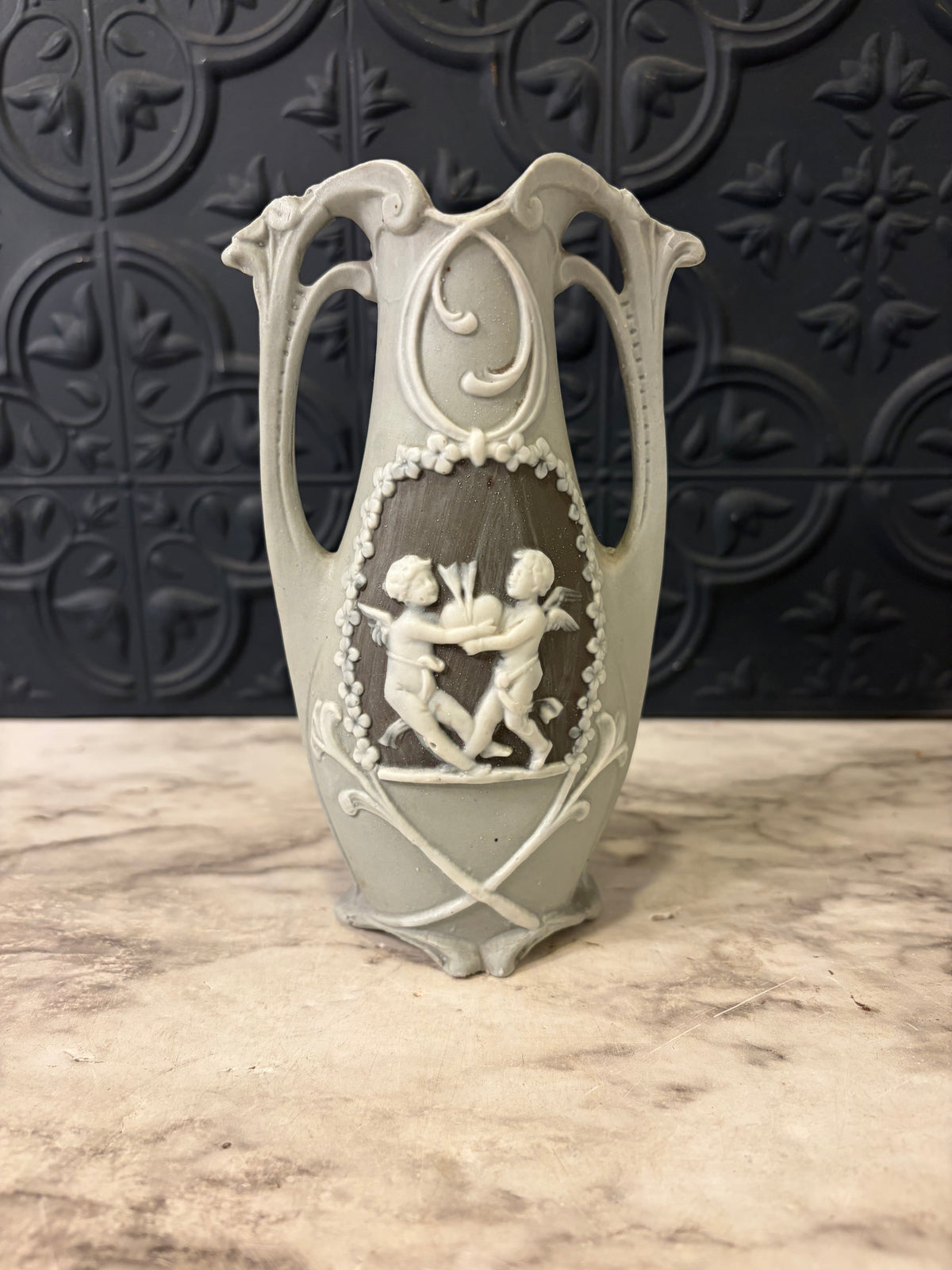Double Handle Bisque Porcelain Vase with Cherubs