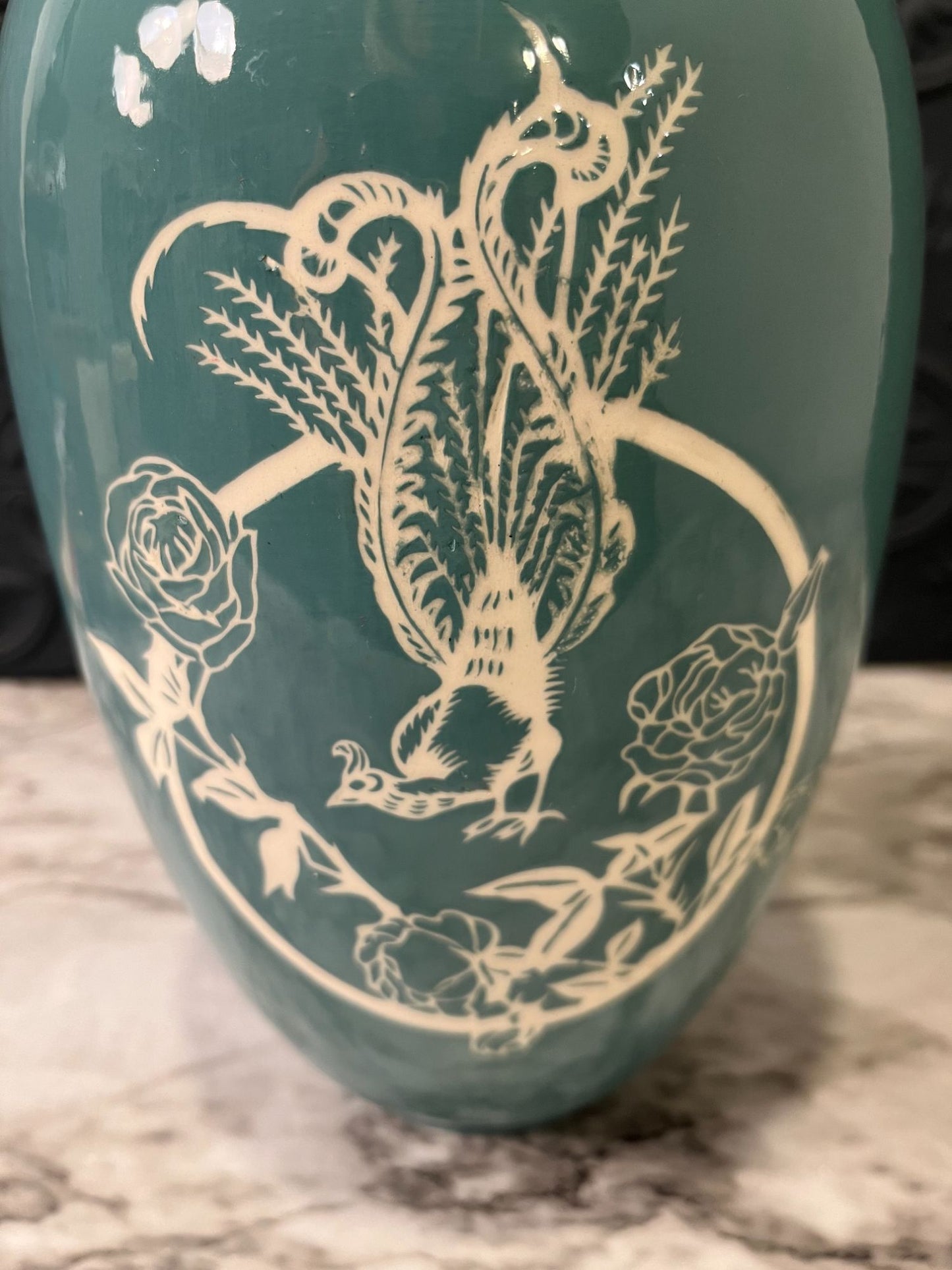 Blue vase with rooster