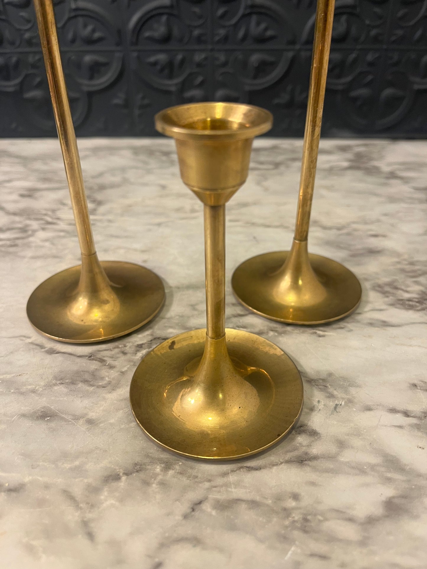 Set of Three Brass candlesticks