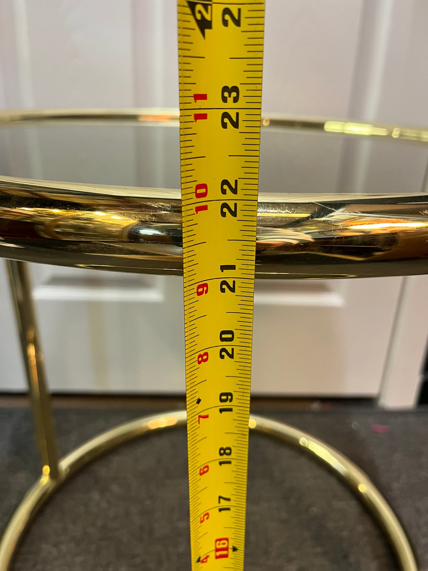 Round Brass side table with smoke glass
