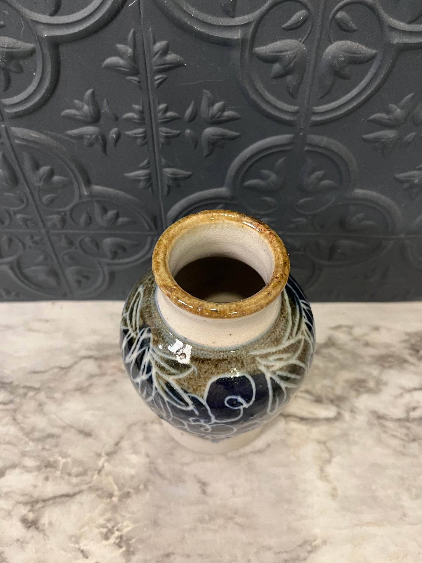 Pottery vase with Grape design