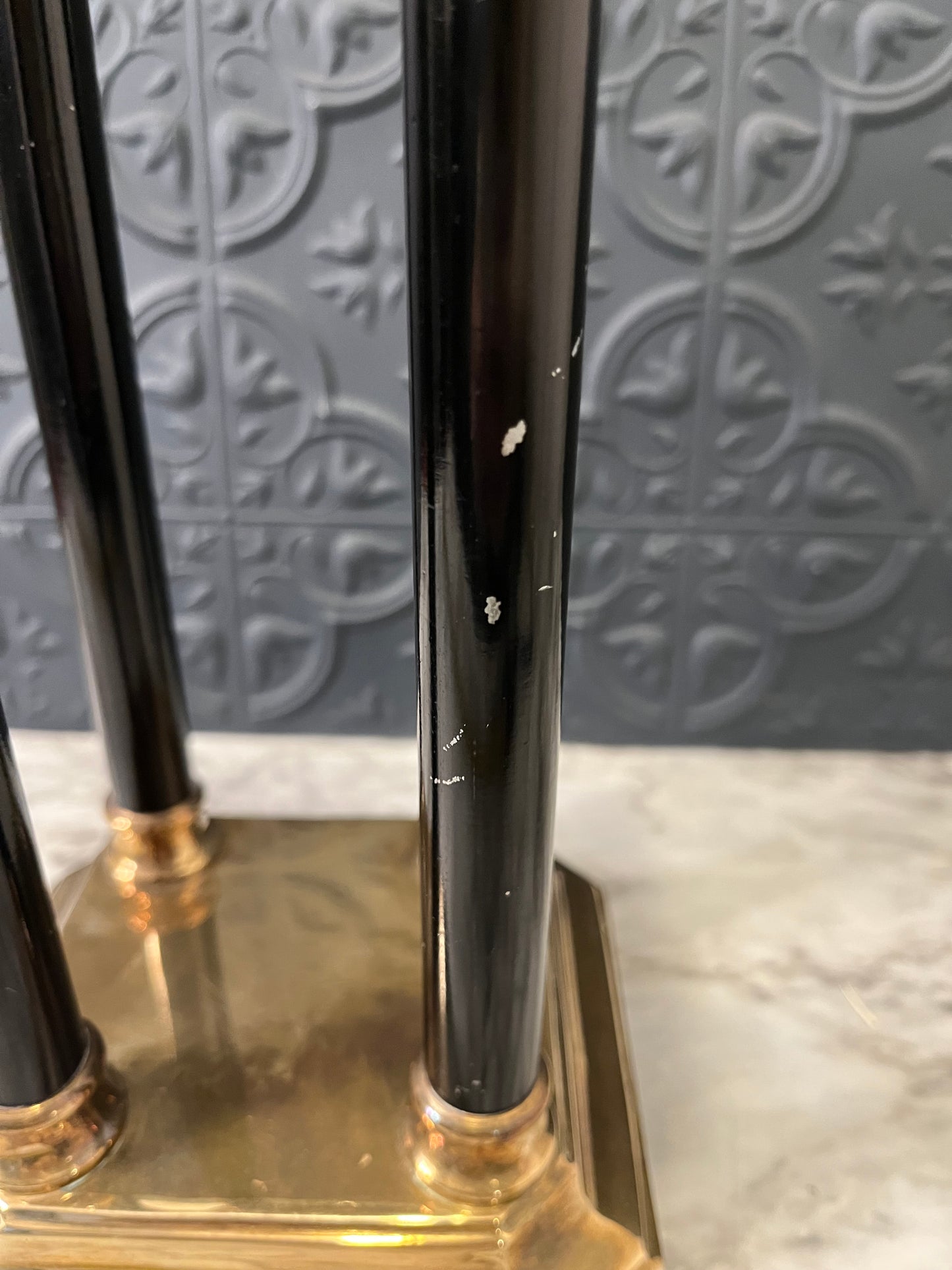 Brass and black column candle holder
