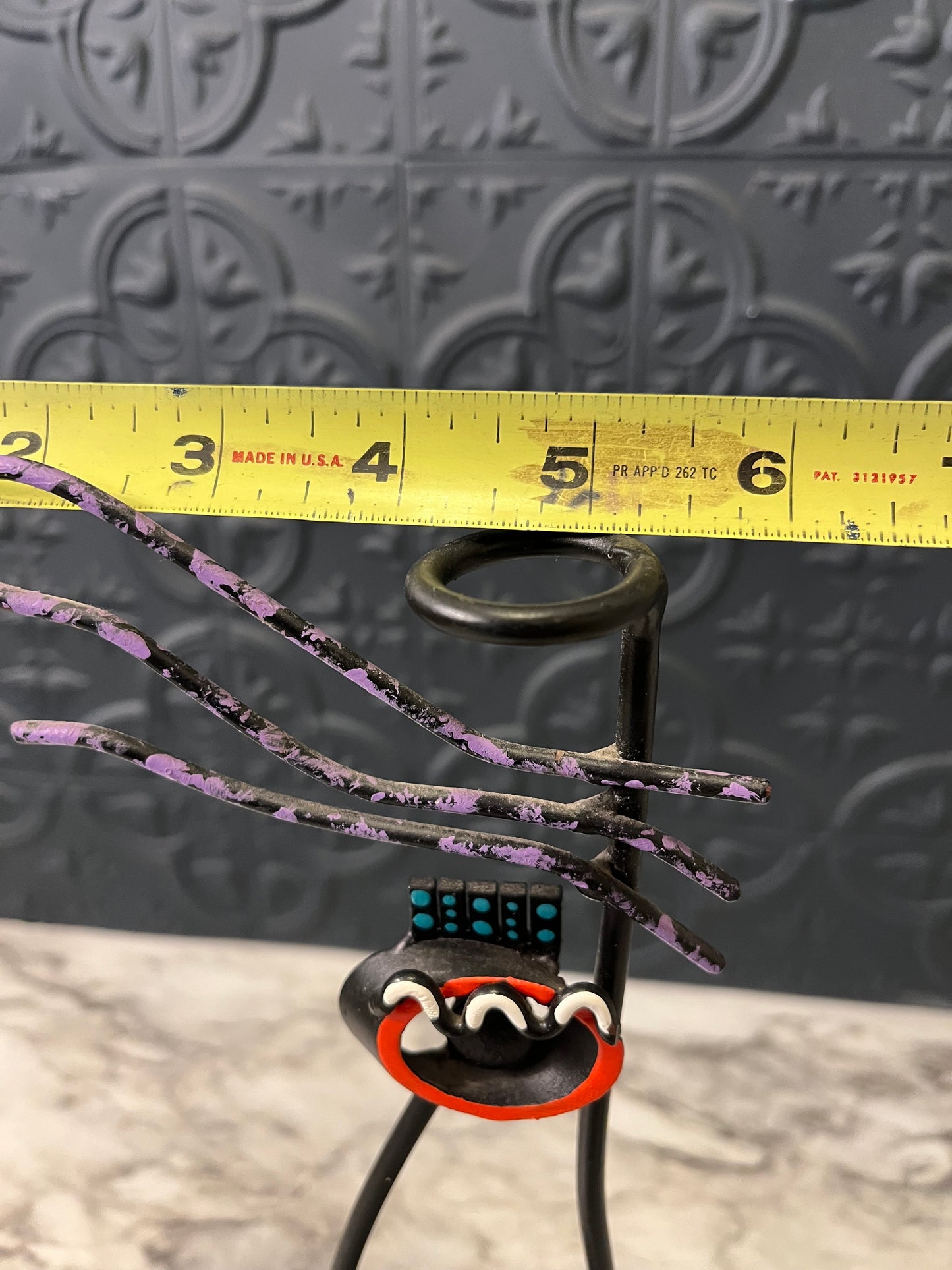 Metal abstract candle holder