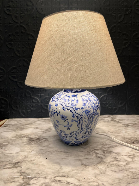 Blue and white table lamp with ribbon