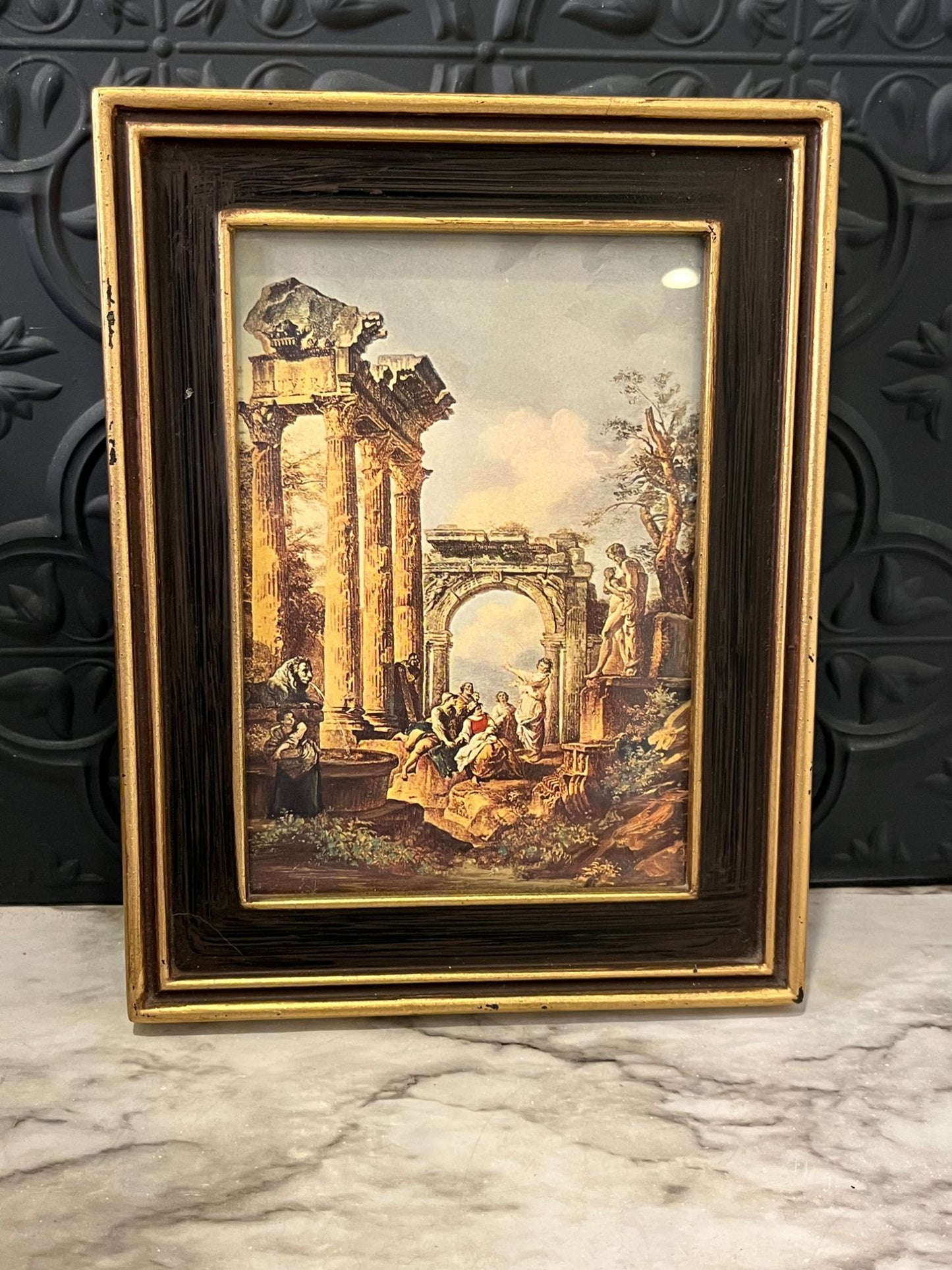 Roman print in black and gold  frame