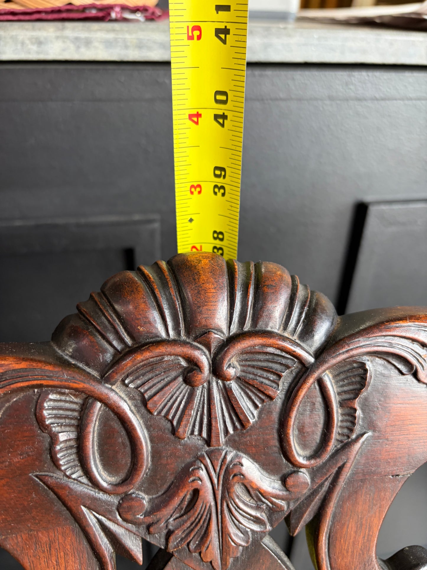 Antique Carved Chair with Black Seat