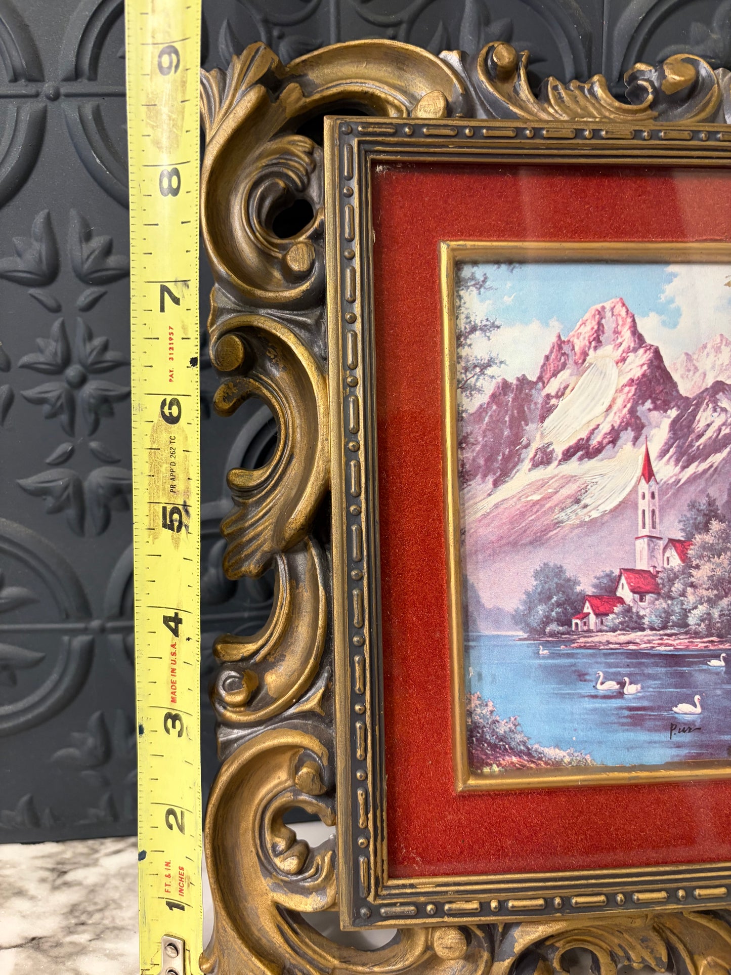 Black and Gold Molded Frame of Snow Covered Mountain