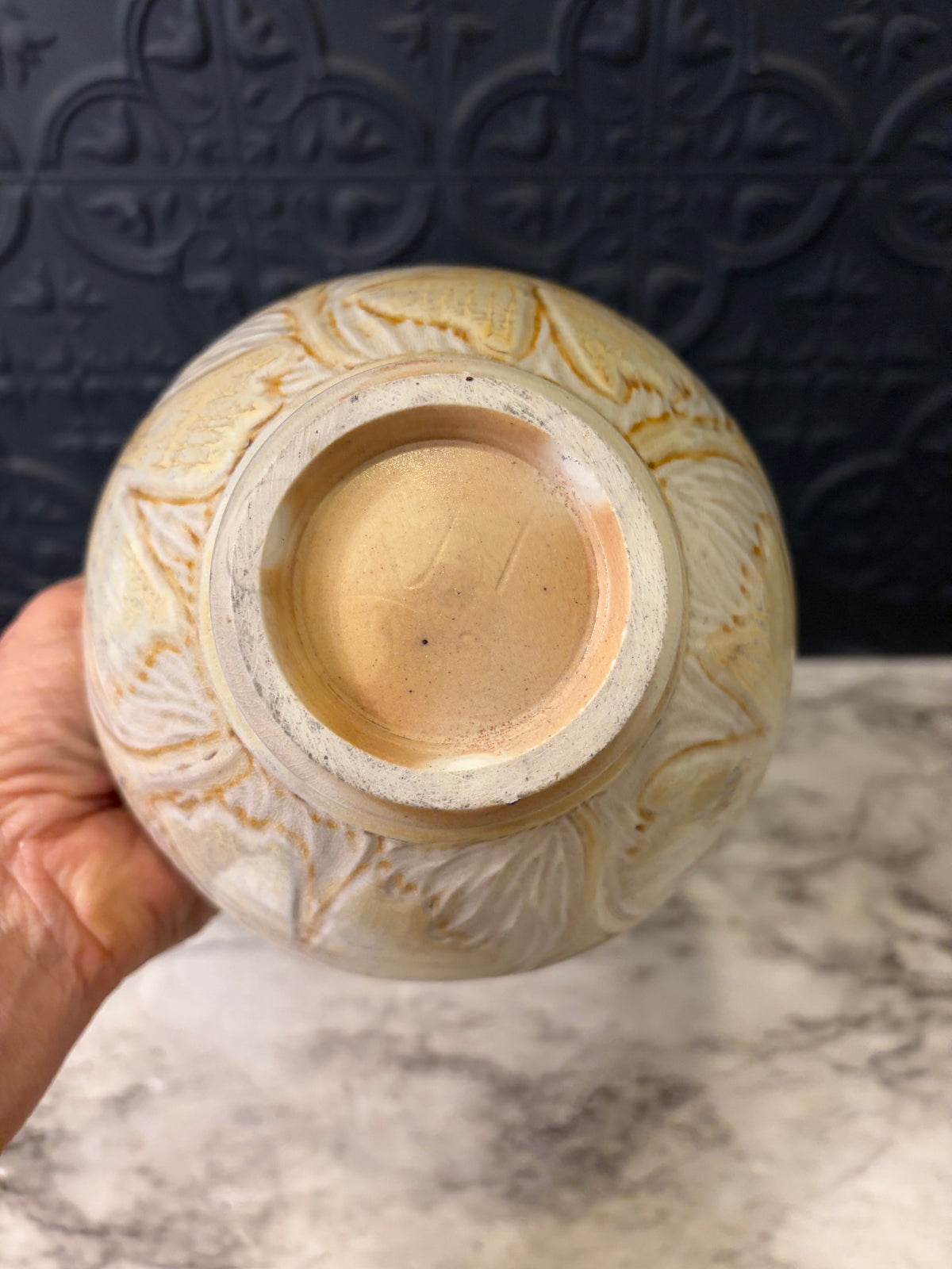 Cream Pottery Bowl With OrangE Swirl Design