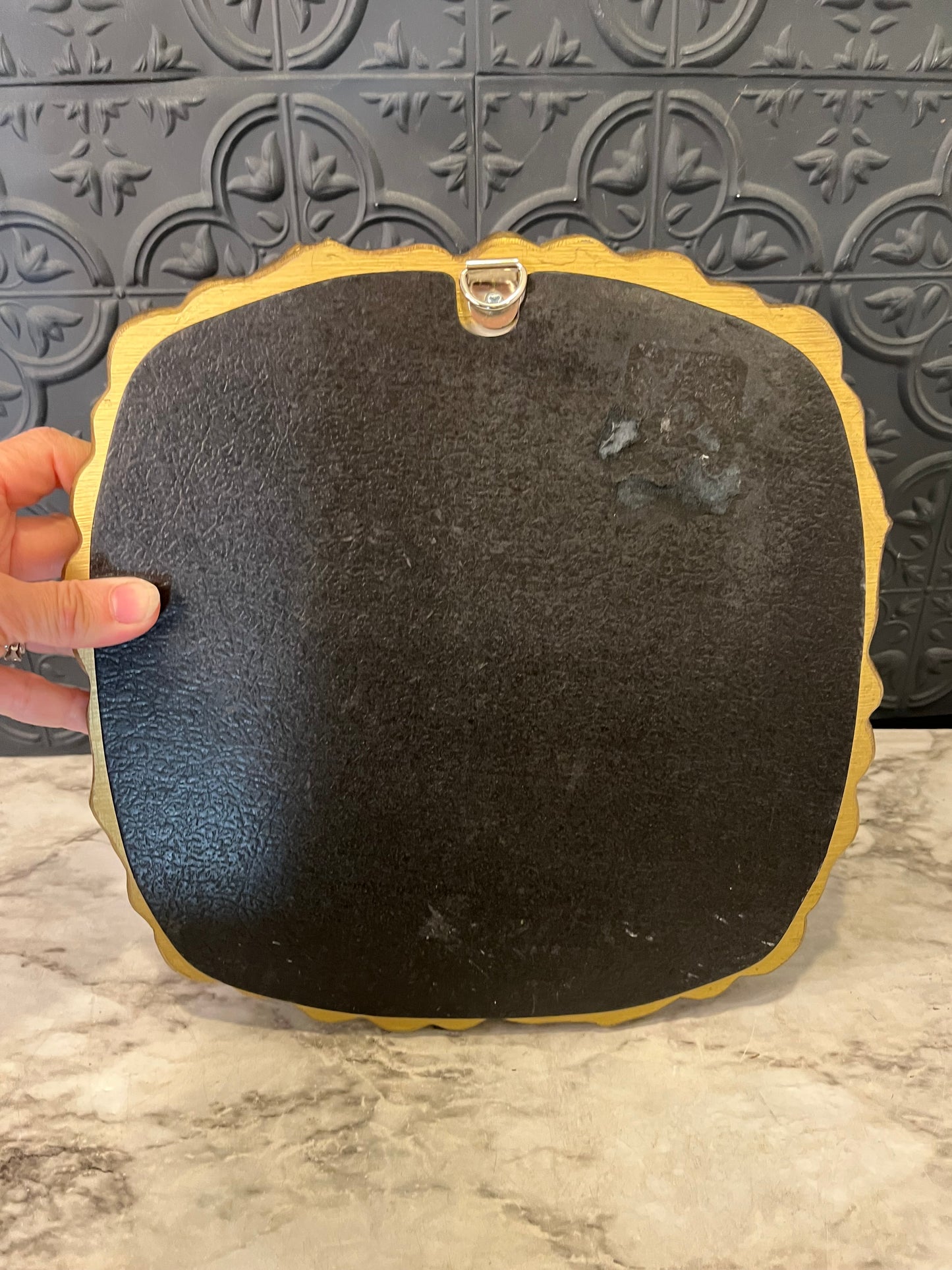 Ornate round mirror with resin frame 11"