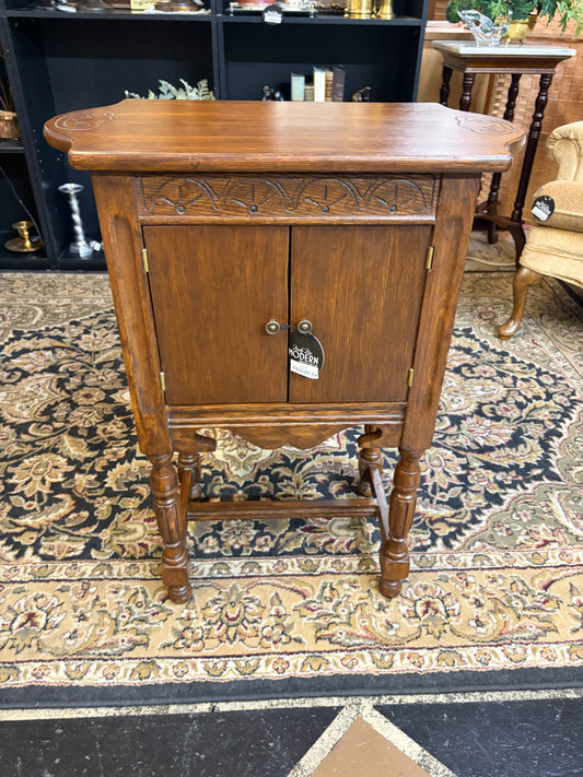 Antique Wood Cabinet with Carved Details